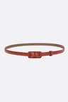 Thin red belt with a covered rectangular buckle