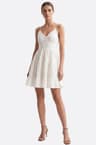 Short white dress with thin straps and smocked back