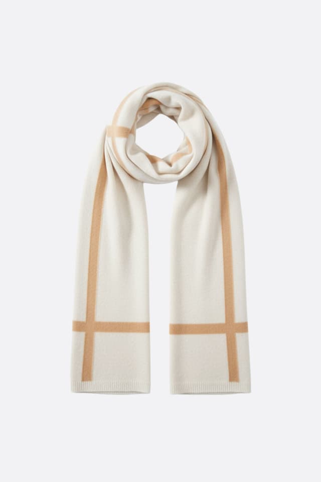 Sciarpa in cachemire bianca ornata da bande marroni, un accessorio morbido per valorizzare un outfit elegante in occasione di una serata.