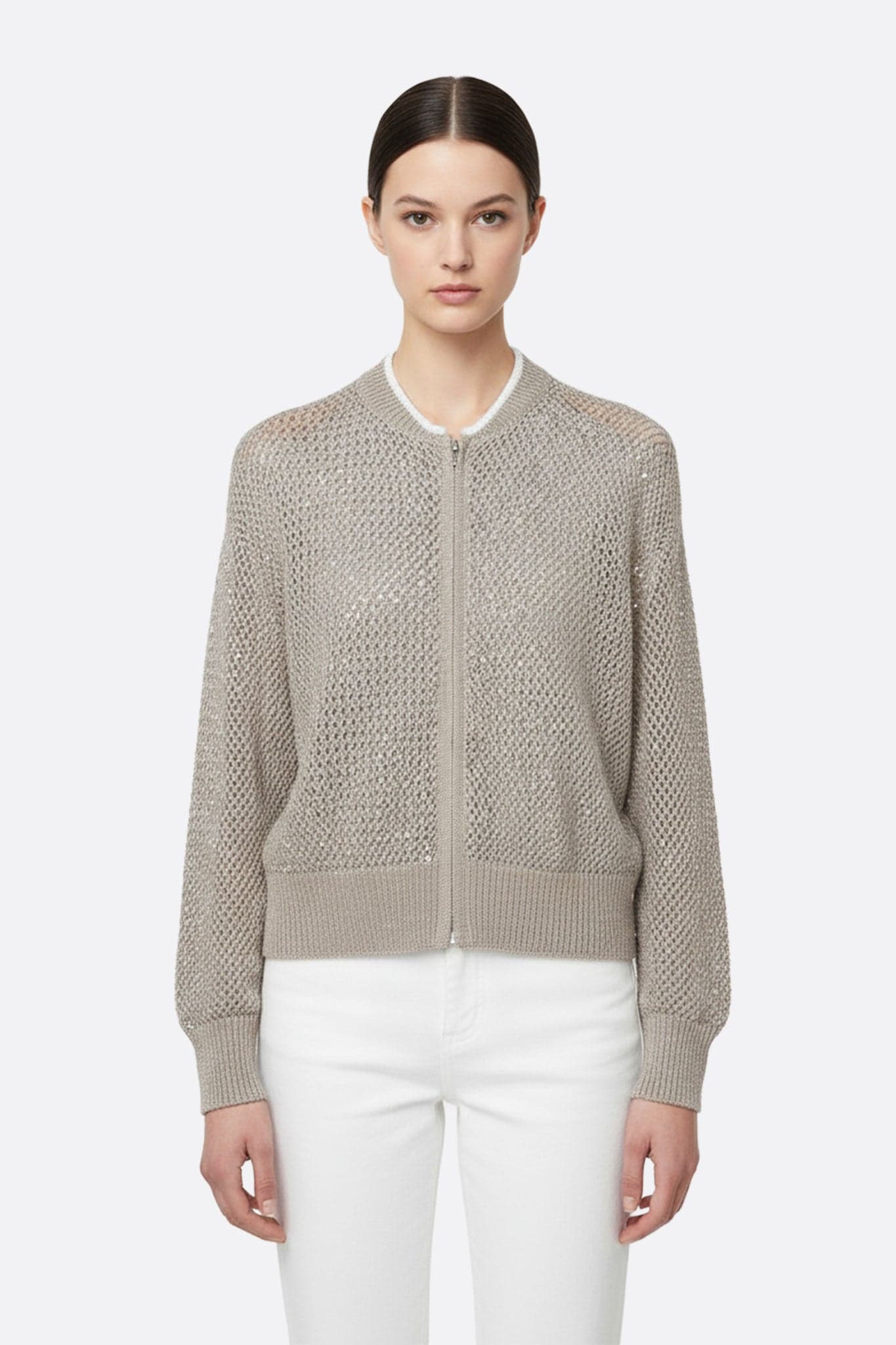 Gilet beige sable zippé en coton et tencel, ajouré et orné de sequins, parfait pour sublimer une tenue élégante de soirée.