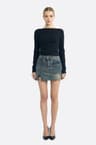 Short denim skirt with asymmetrical closure