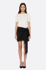 Jupe noire asymétrique en satin et dentelle