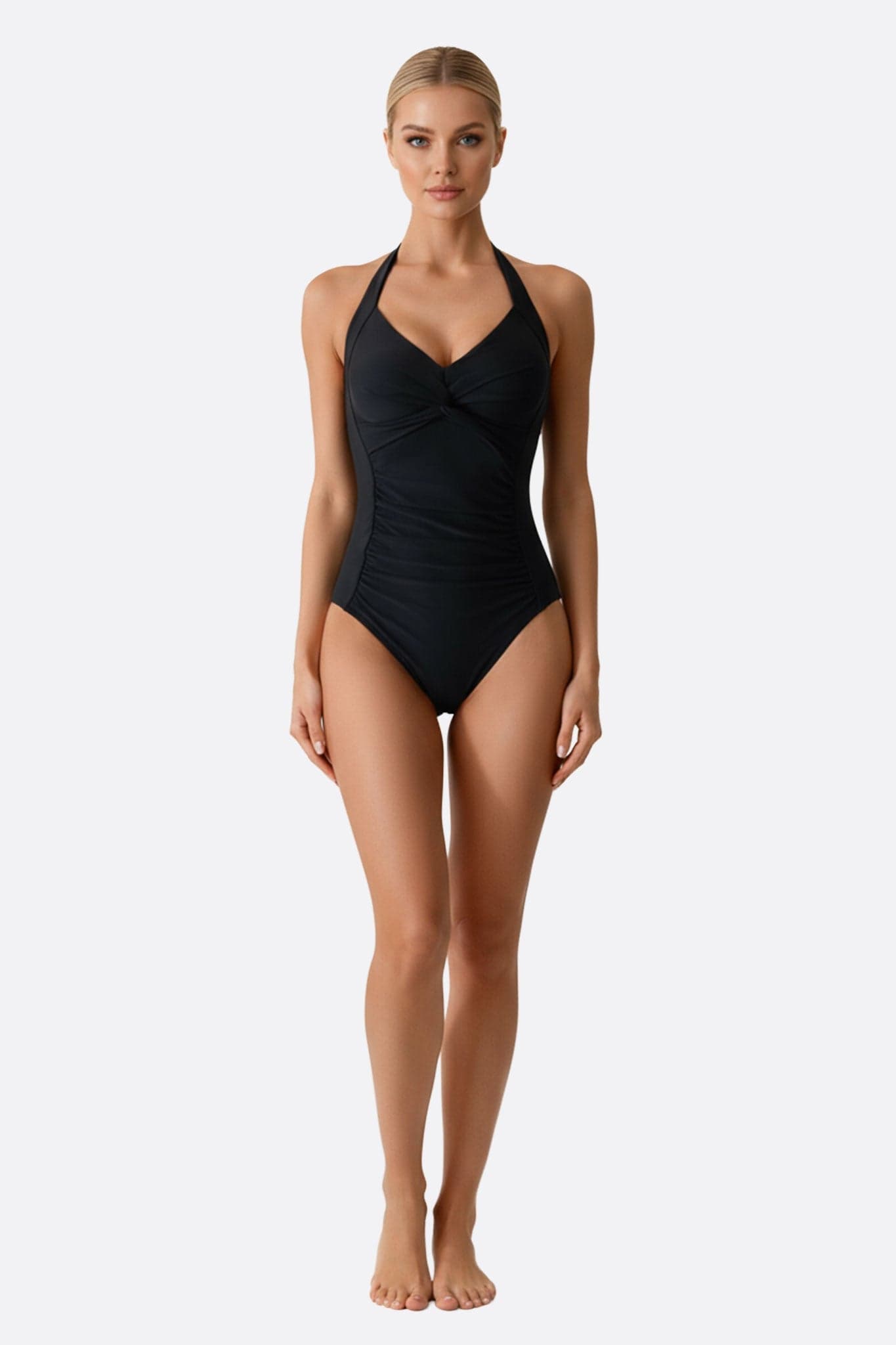 Bañador de una pieza negro con tirantes anudados, diseño elegante y clásico ideal para la playa.