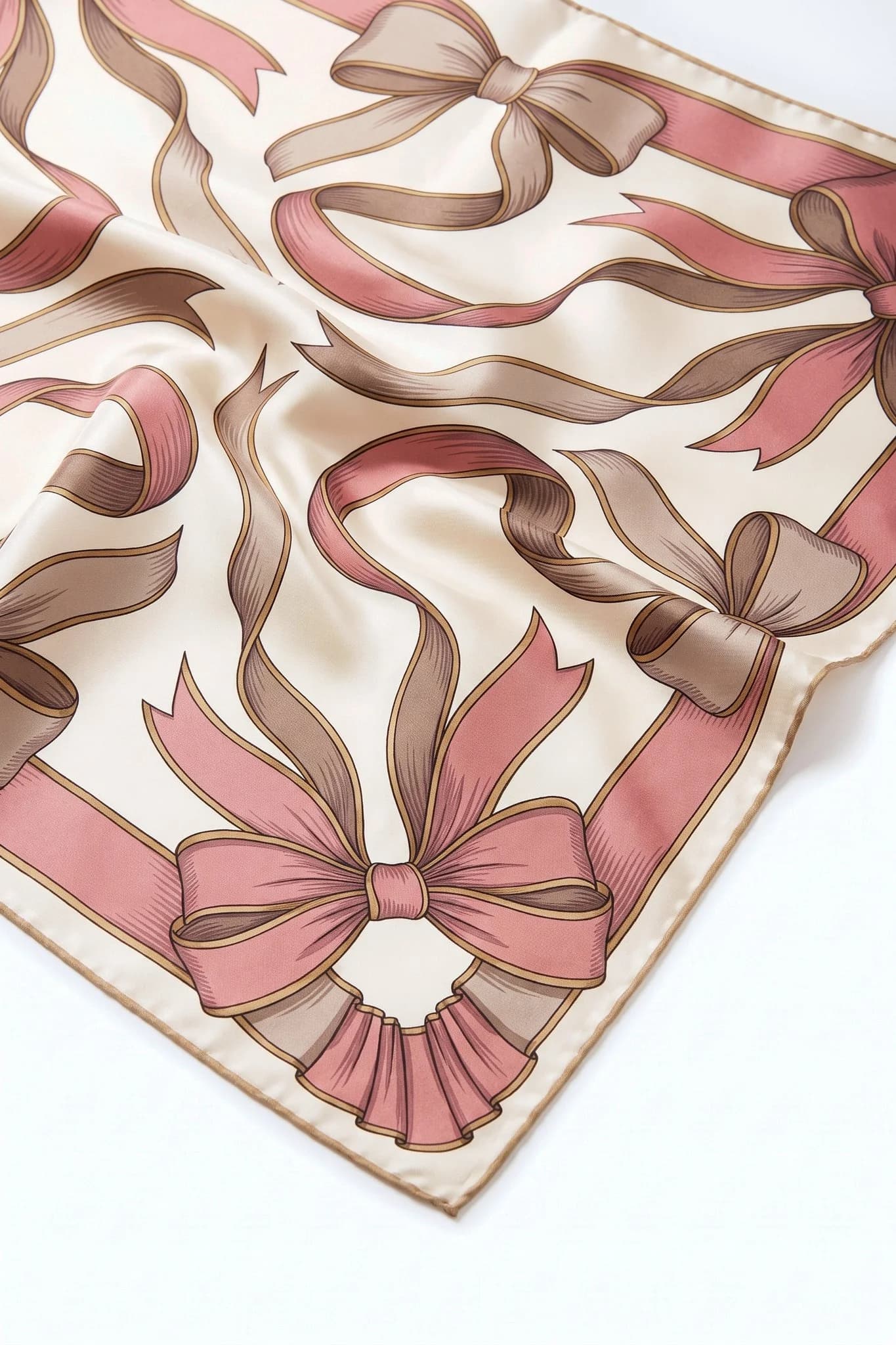 Close-up on the folds of the silk scarf Silk ribbons, silk twill and hand-rolled edge