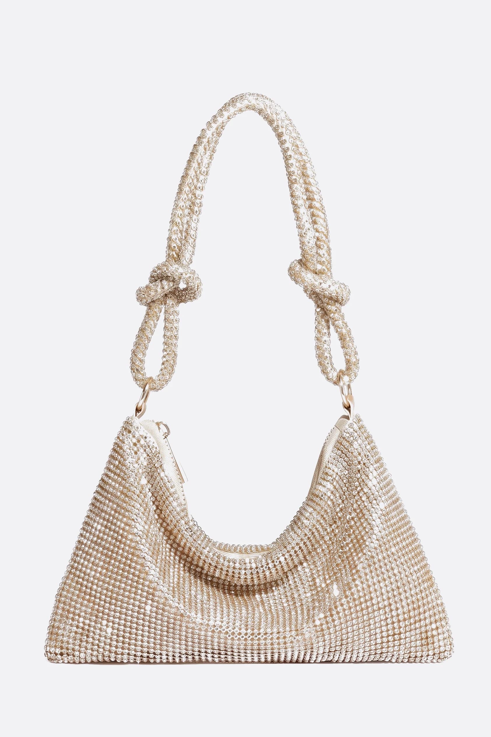 Pochette da sera dorata interamente ricoperta di strass, vista frontale su sfondo grigio