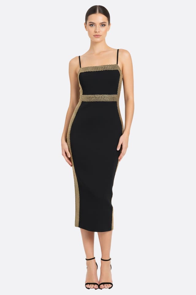 Robe midi noire en maille sculptante avec subtils reflets dorés, idéale pour illuminer vos soirées élégantes et raffinées.