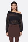 Black asymmetrical draped top with sculpted flower