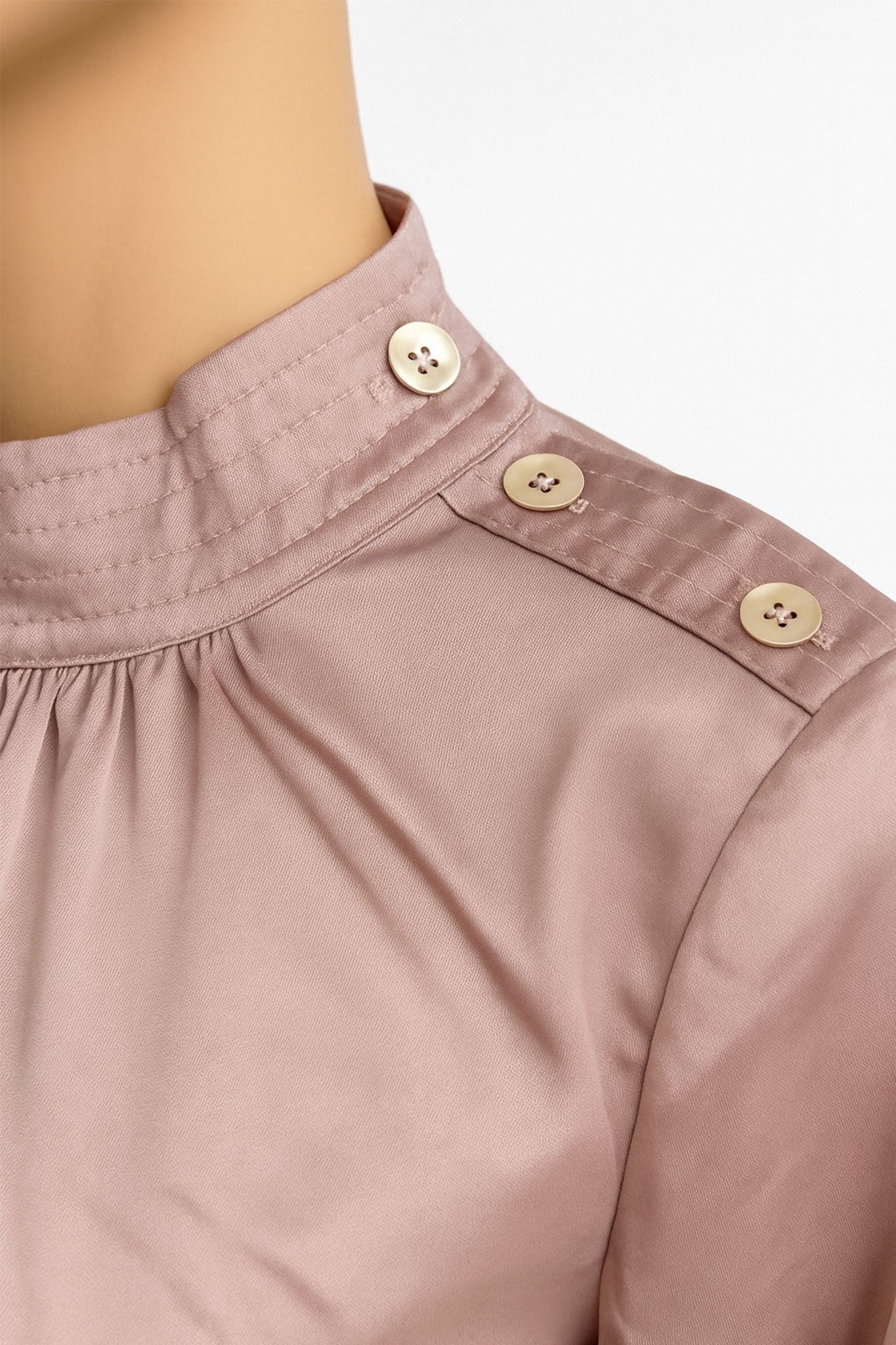 Frilled stand collar of the powder pink satin blouse, highlighting its refined elegance for special occasions.