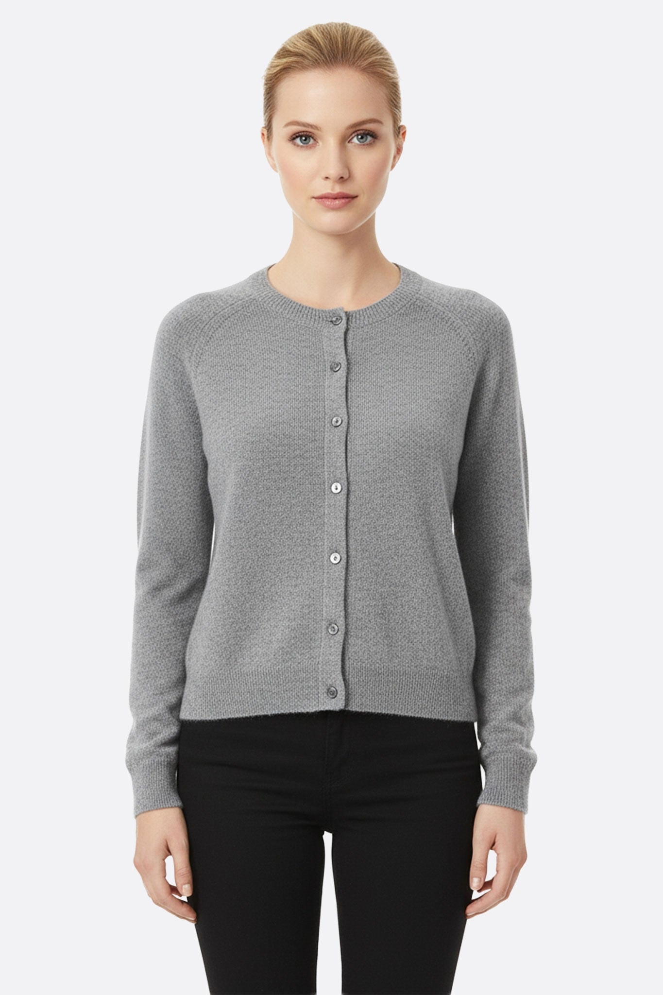 Gray virgin wool cardigan with long sleeves, highlighting its elegant cut and soft texture for a chic look.