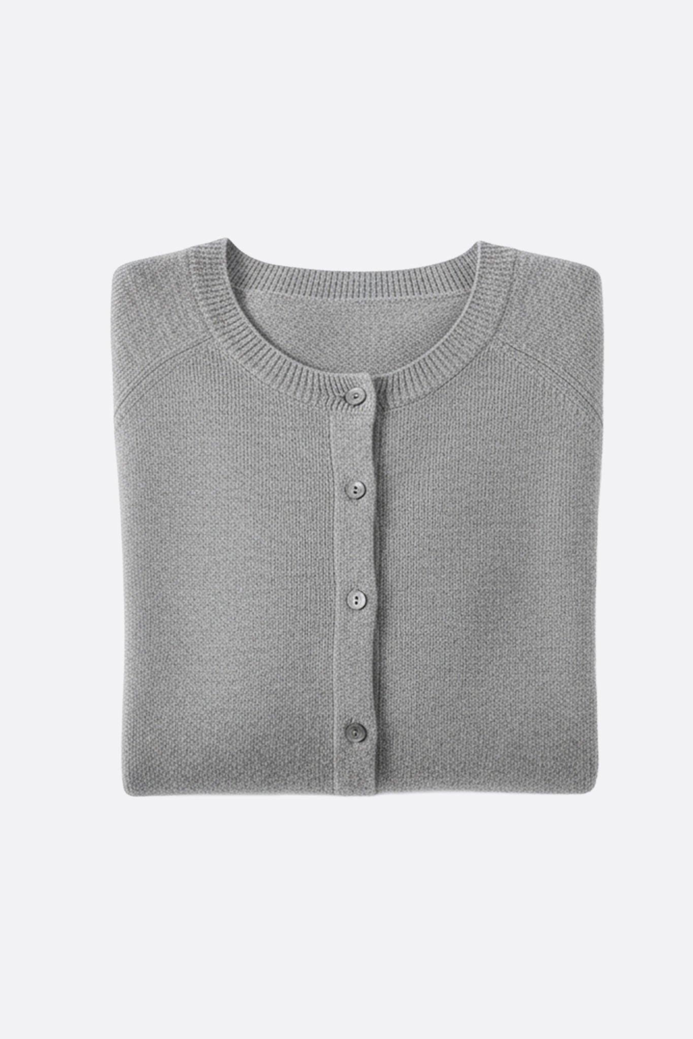 Textured detail of the back of the gray wool cardigan, emphasizing artisanal quality and chic style for any occasion.