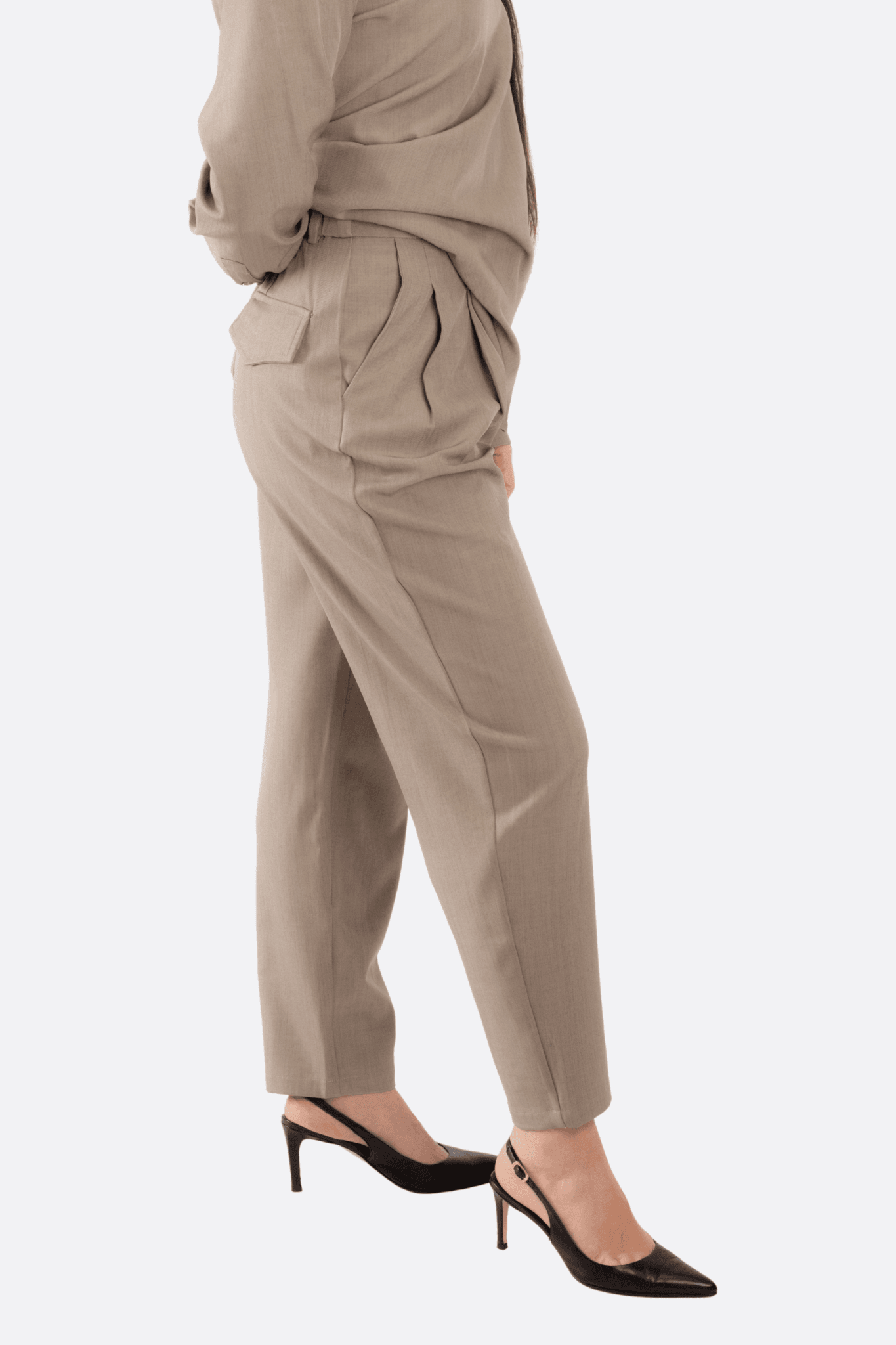 Delicate and flowing texture of the coordinated gray set, highlighting the texture and oversized style of the shirt and...