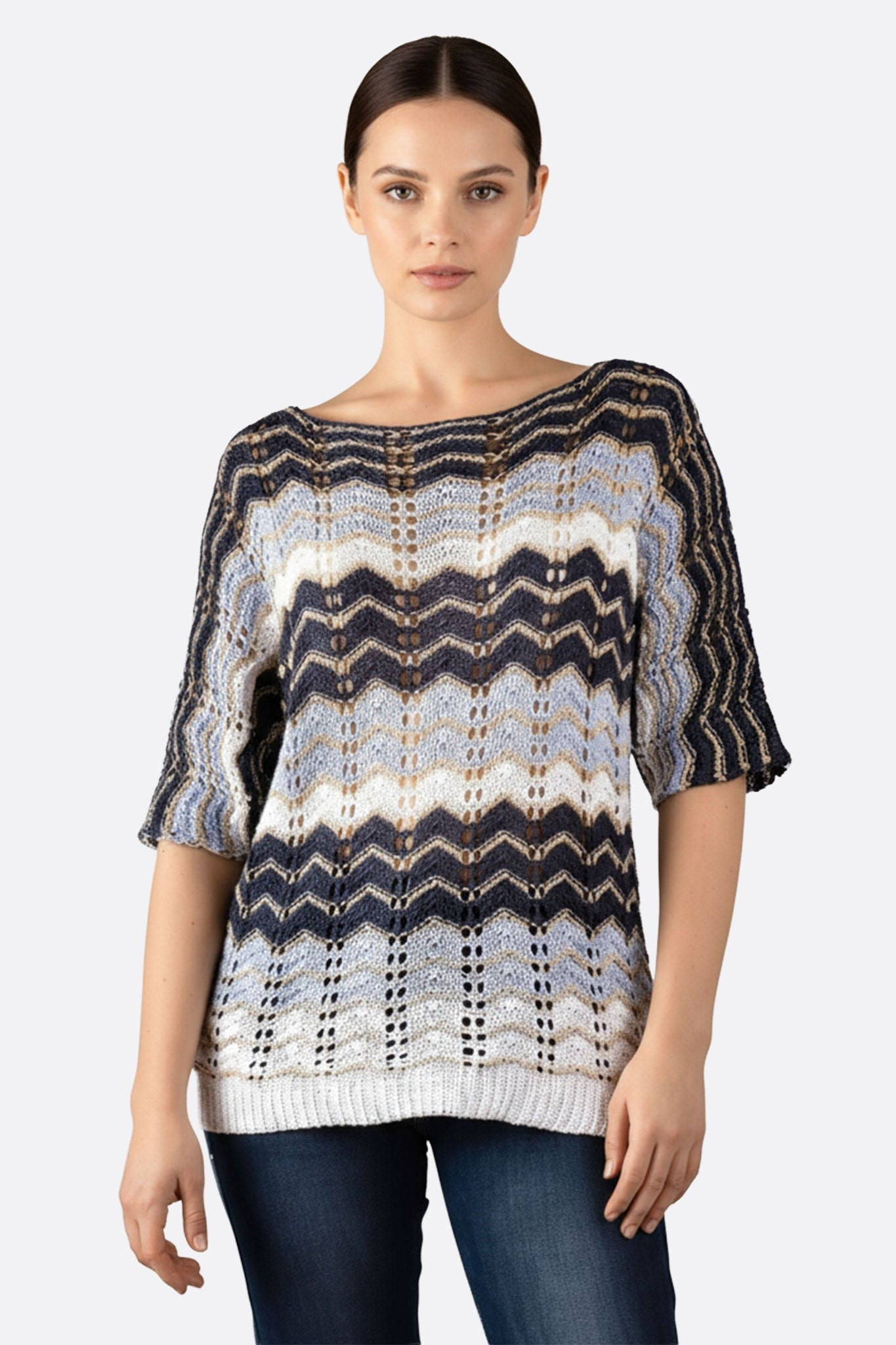 Chic blue and white openwork knit pullover, chevron pattern, perfect for an elegant evening or everyday look.