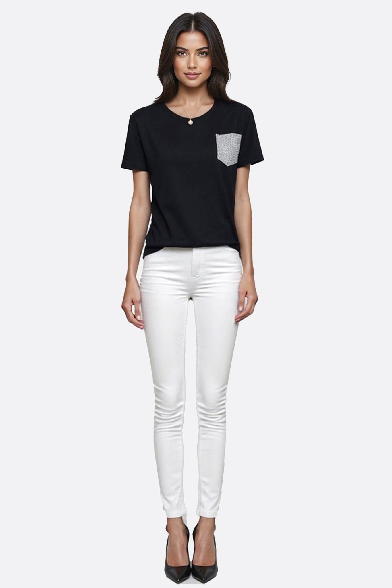 Close-up on the rhinestone pocket of an elegant black t-shirt, an elevated essential for casual occasions.