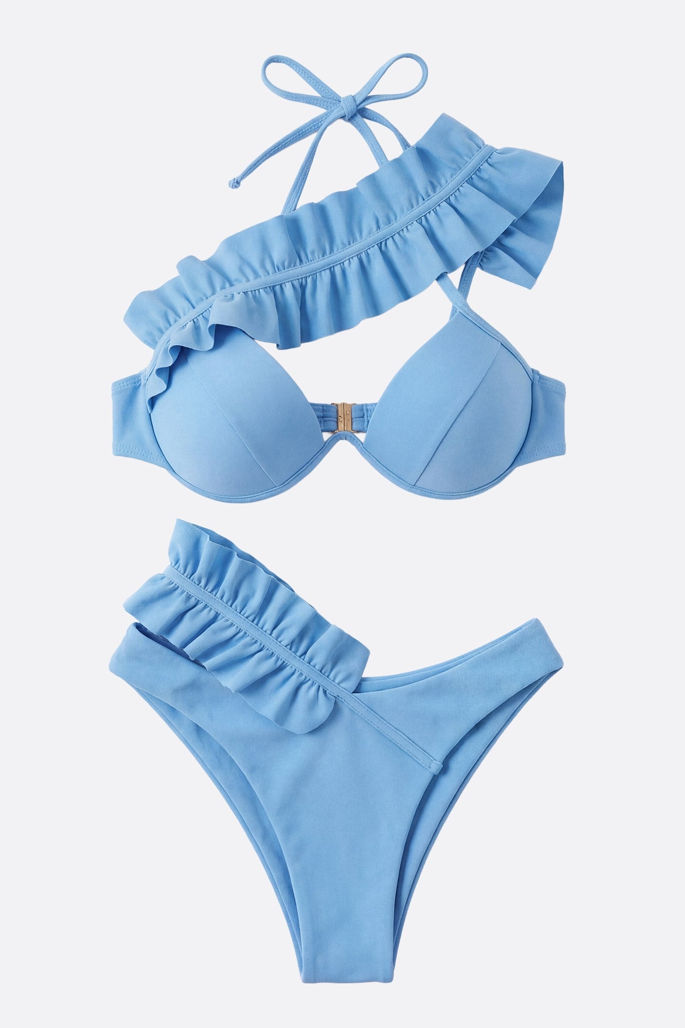 Back detail of the pastel blue two-piece swimsuit, highlighting the light texture of the ruffles for a chic look