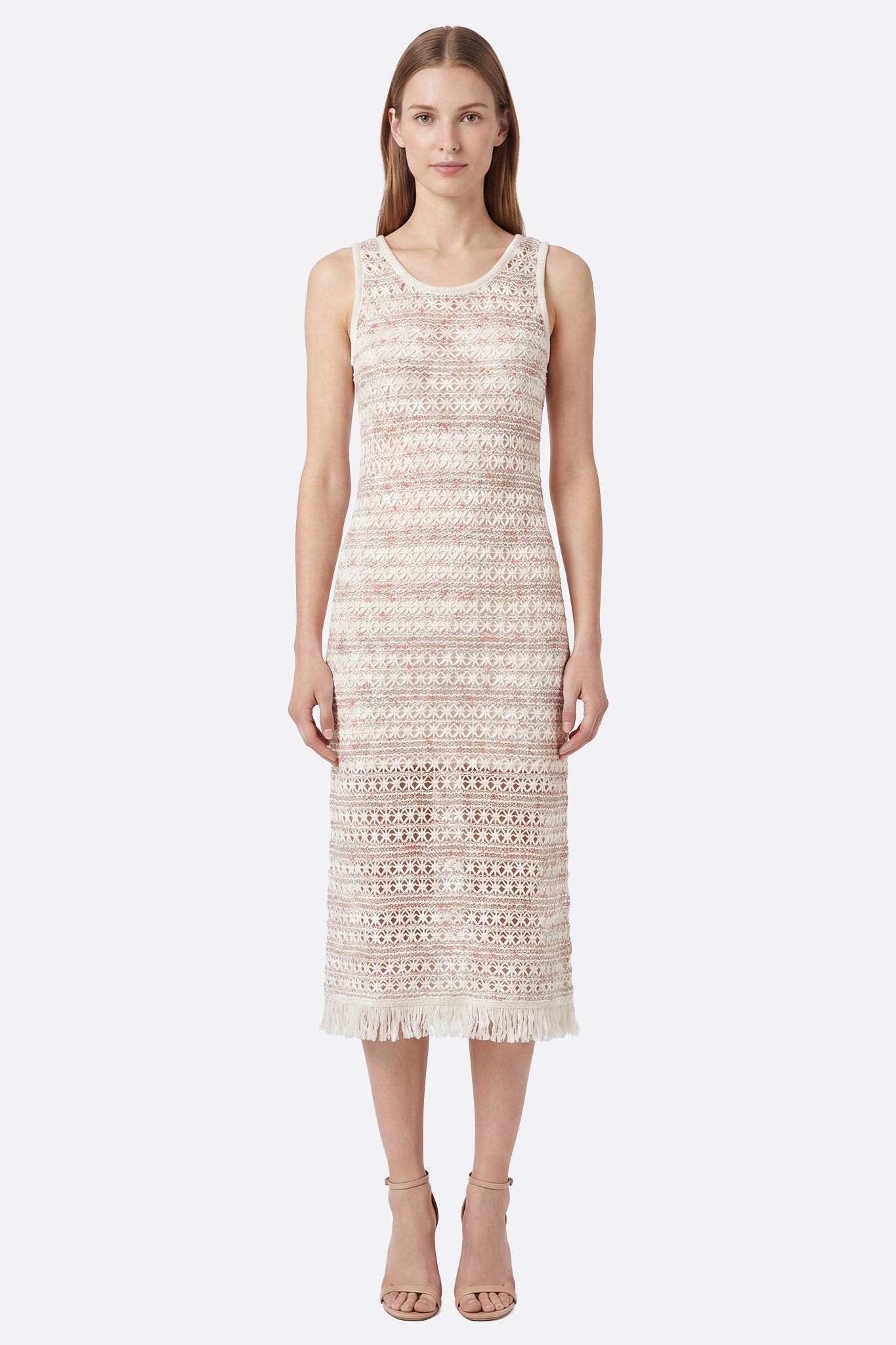 Ecru textured midi dress with gradient pattern worn front by model, detail of openwork fabric