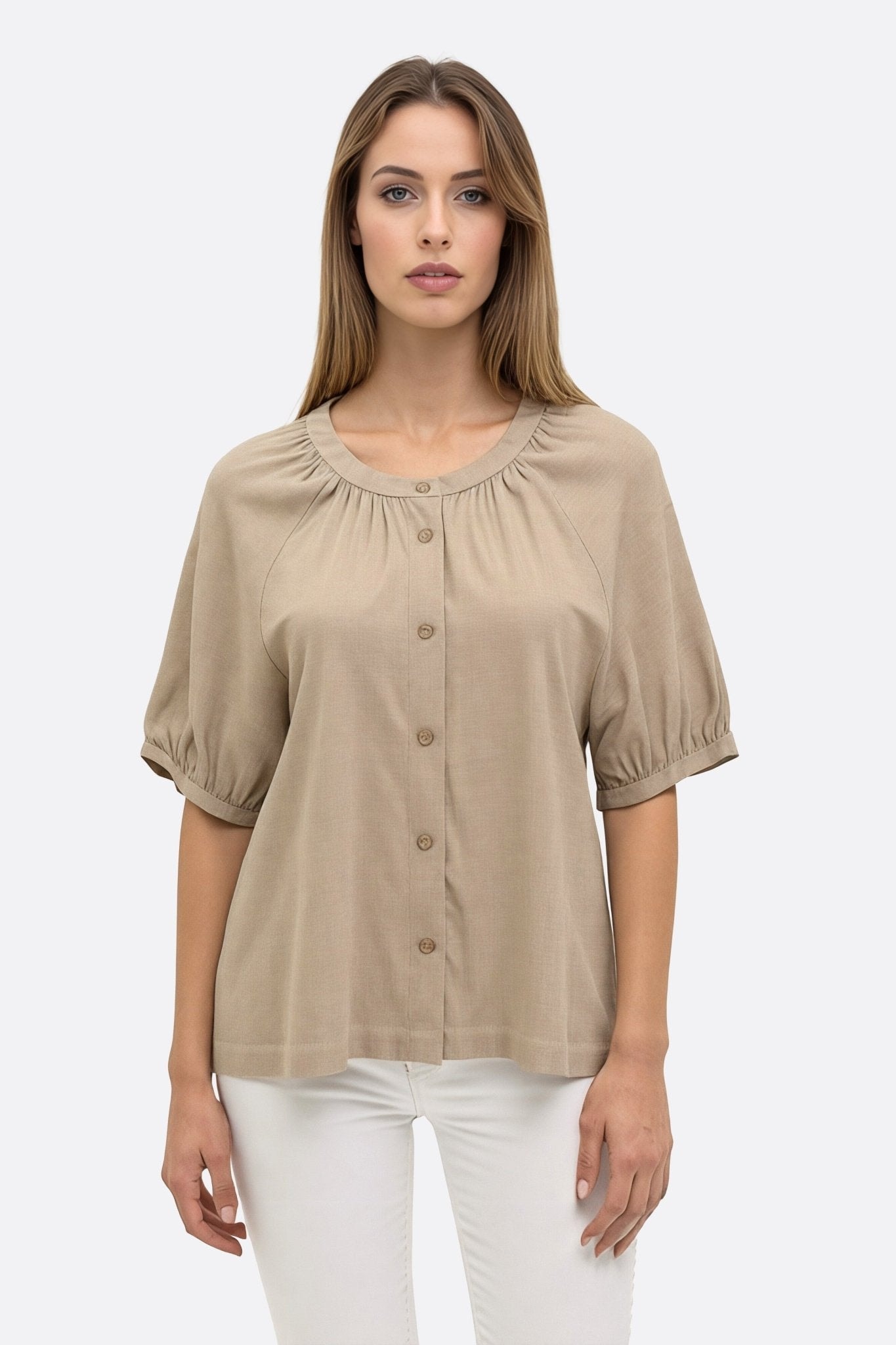 Beige linen blouse with short puffed sleeves, ideal for elevating an office outfit or for an elegant outing.