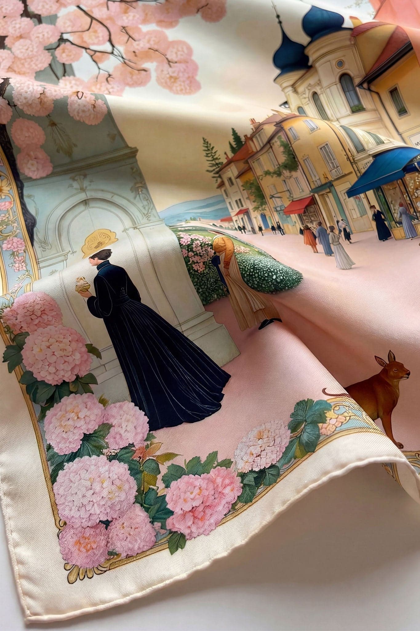 Graceful perspective of a 90x90 cm double-faced silk carré adorned with a whimsical Misciano print, ideal for stylishly...