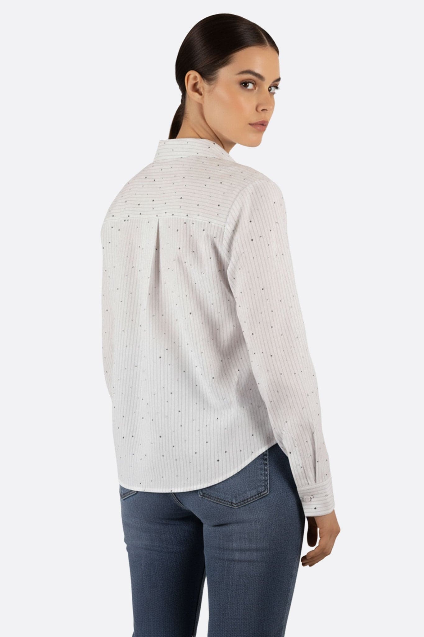 White cotton shirt with subtle stripes and sparkling accents, ideal for a refined look at events...