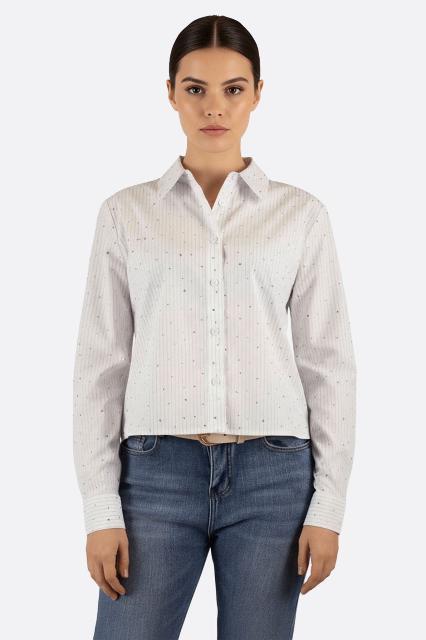 Elegant white cotton shirt with fine stripes and sparkling details, perfect for chic evening outings or professional...