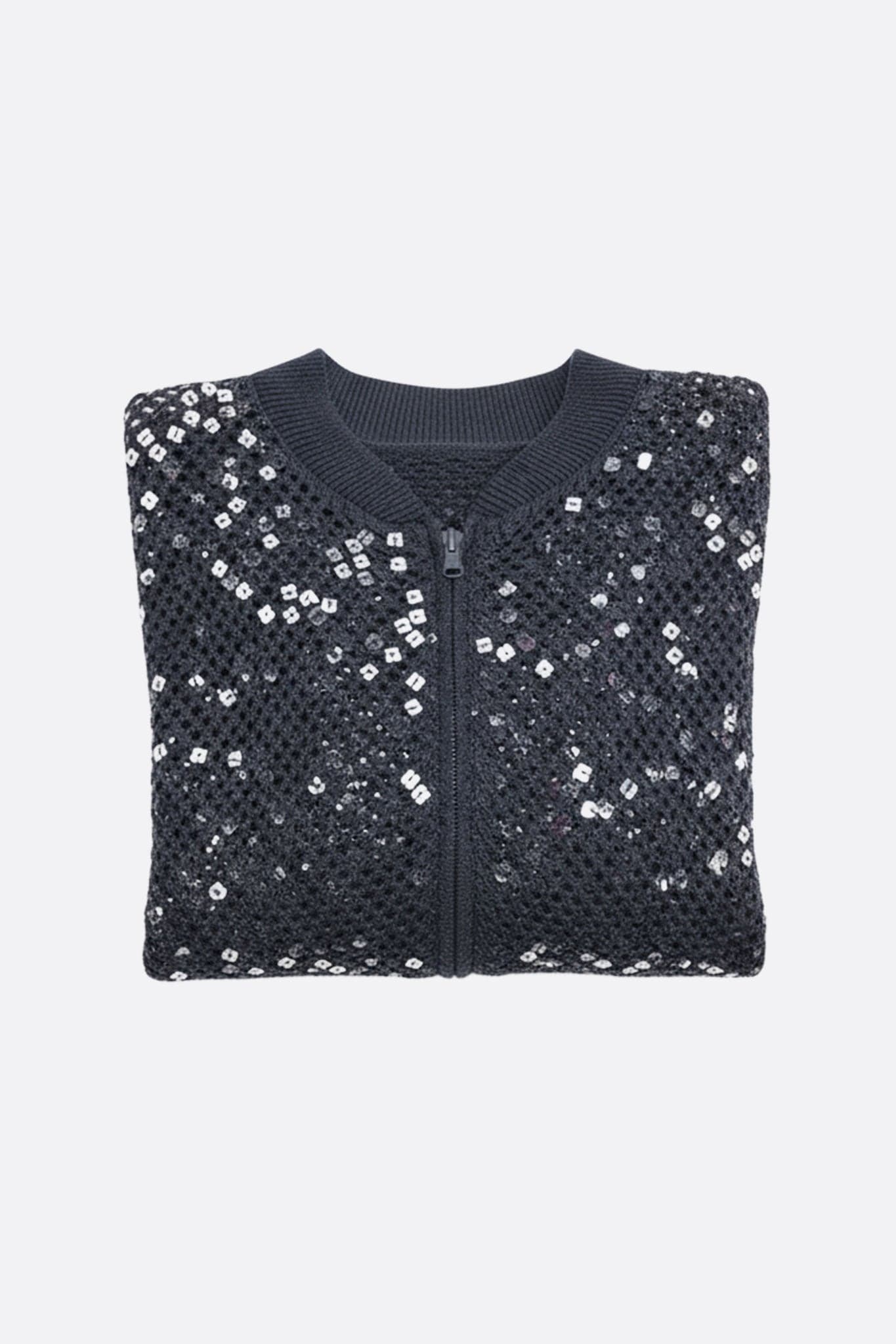 Chaleco gris de calado en lino y algodón con lentejuelas deslumbrantes, perfecto para añadir un toque de elegancia a tu look.
