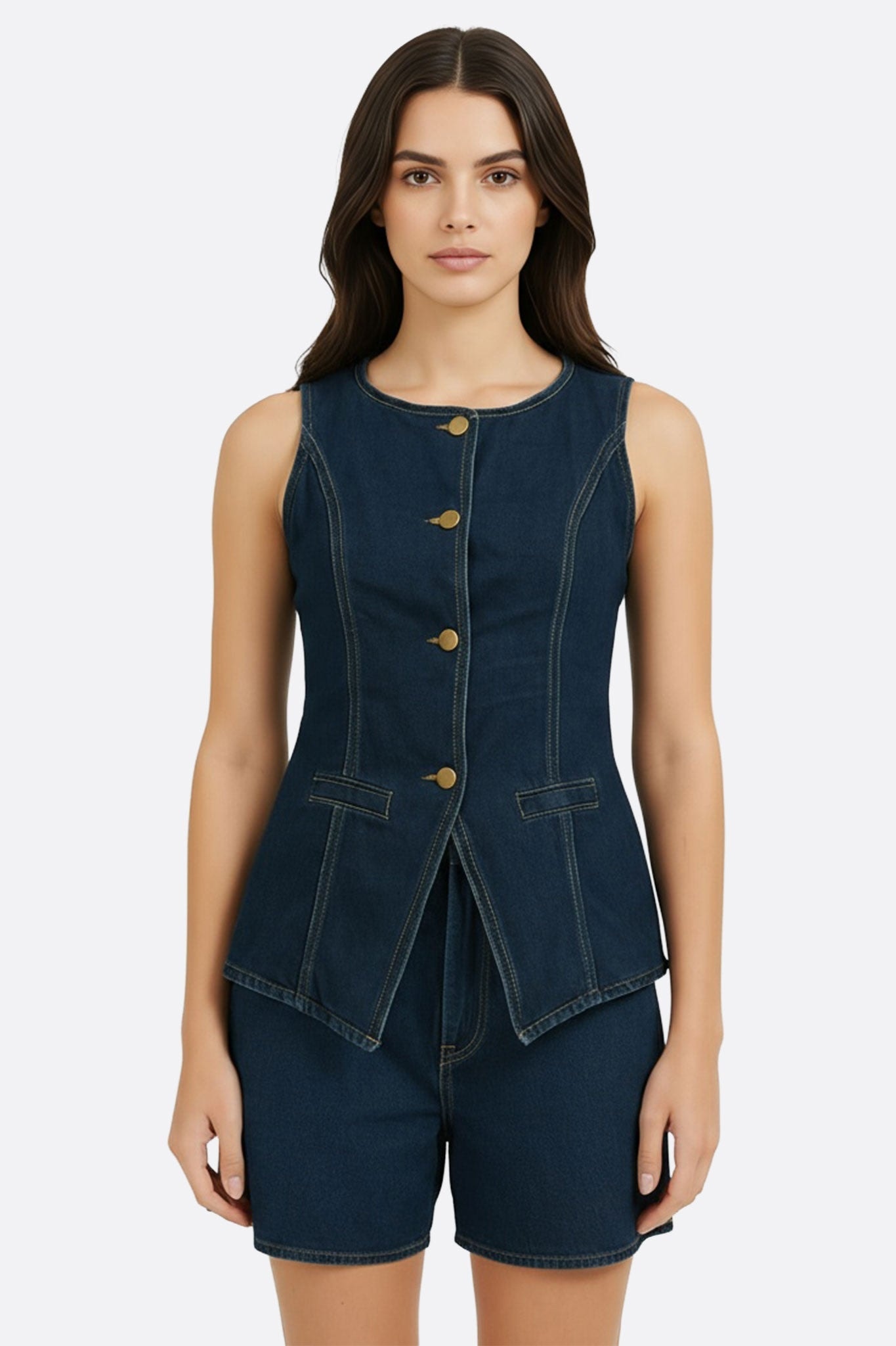 Fitted sleeveless blue denim vest, adding a chic touch to a casual, modern outfit