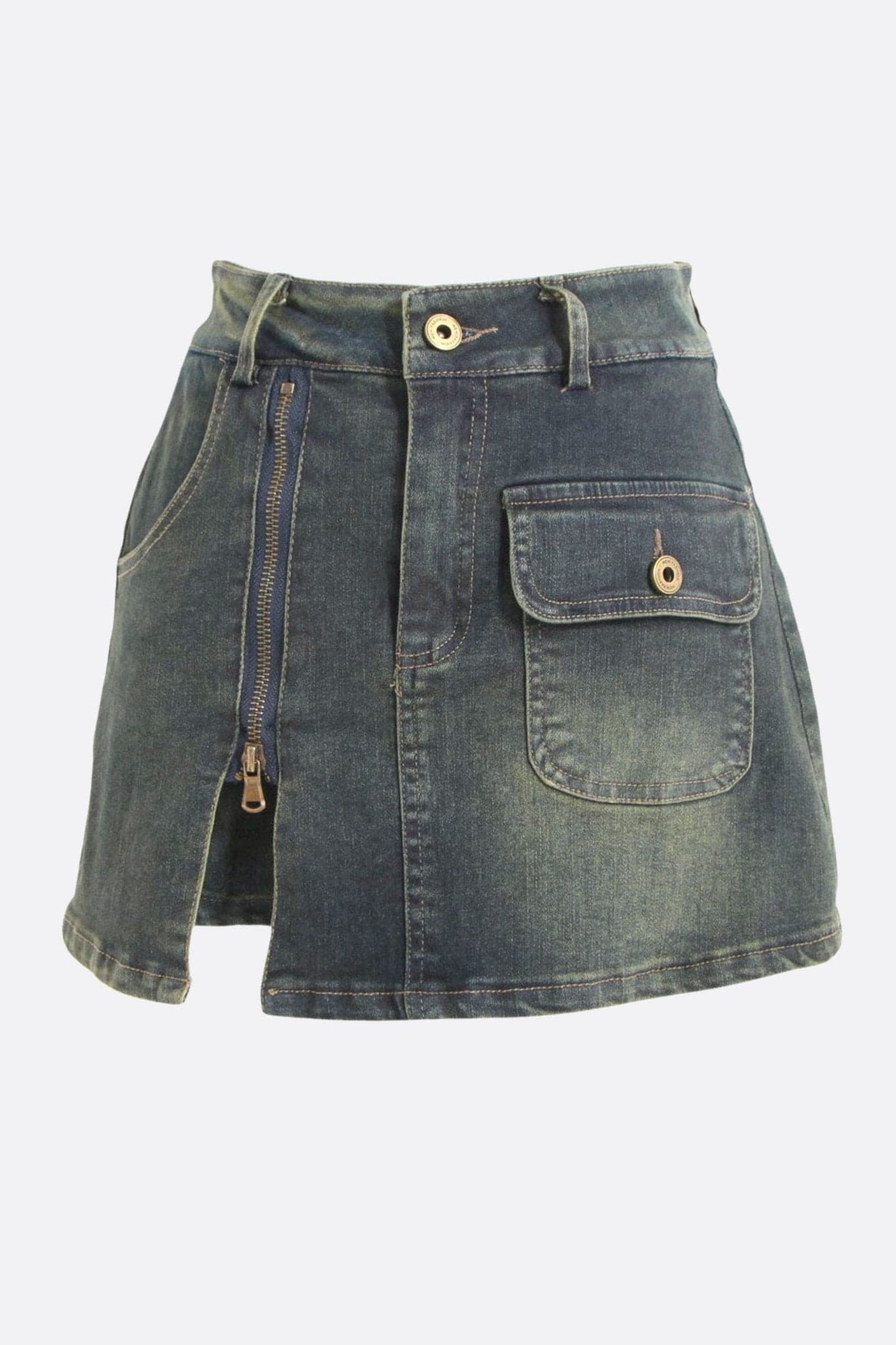 Unique detail of the short denim skirt, showing the texture and asymmetric closure, elegant urban style.