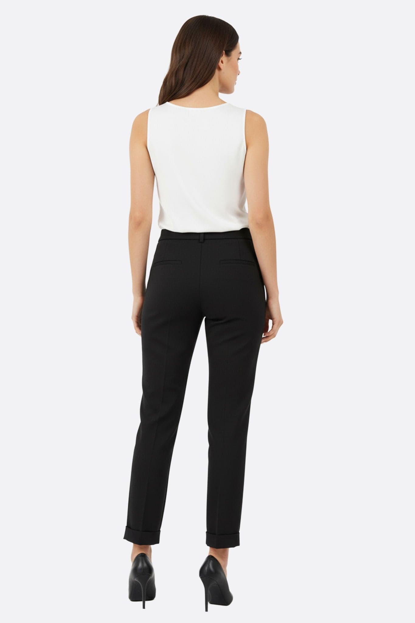 Textured detail of the flowing black trousers, a sophisticated piece to enhance your evening or office outfits.