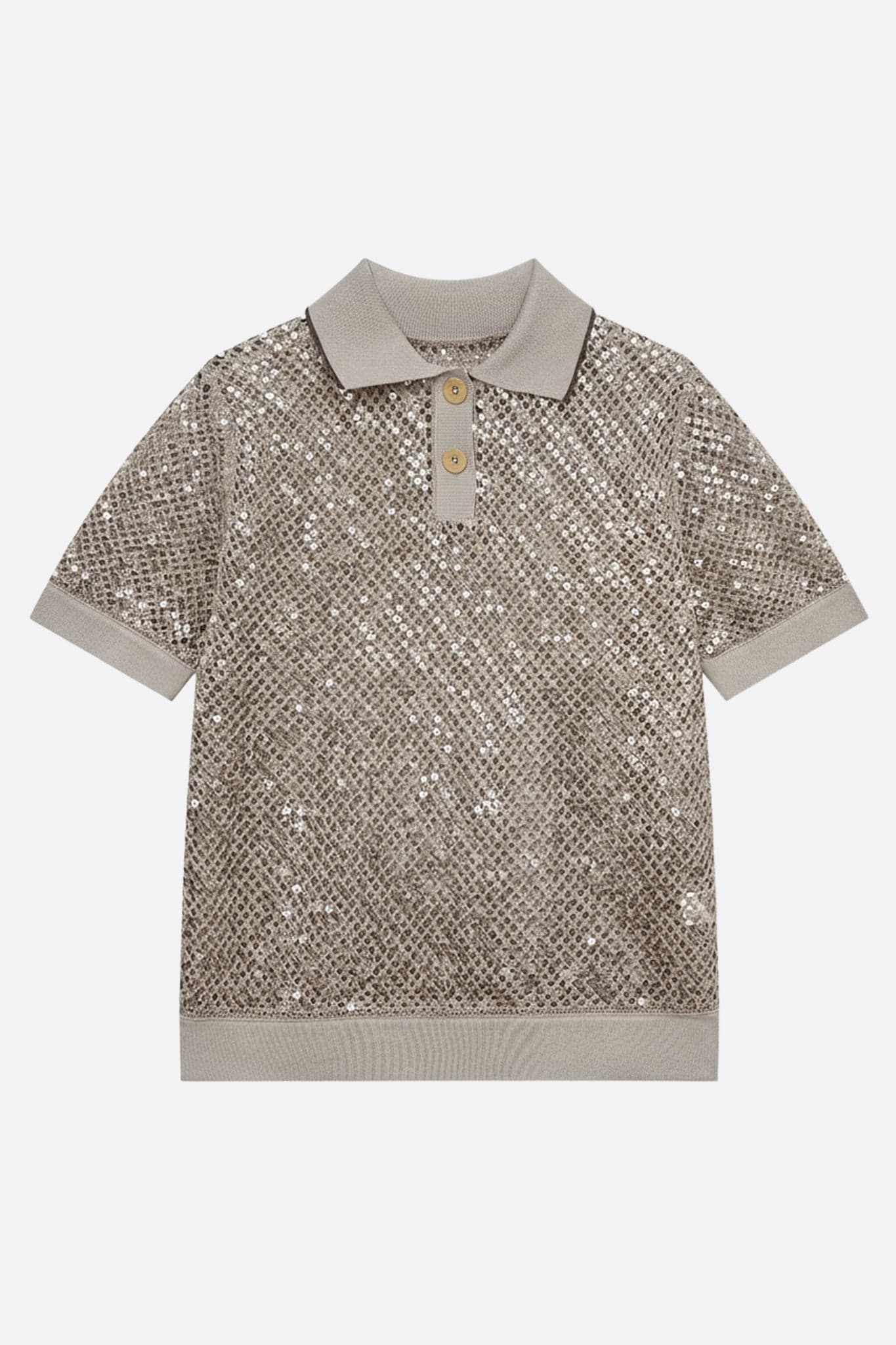 Close-up on the openwork knit of a sand beige polo, embellished with tone-on-tone sequins, perfect for summer elegance.
