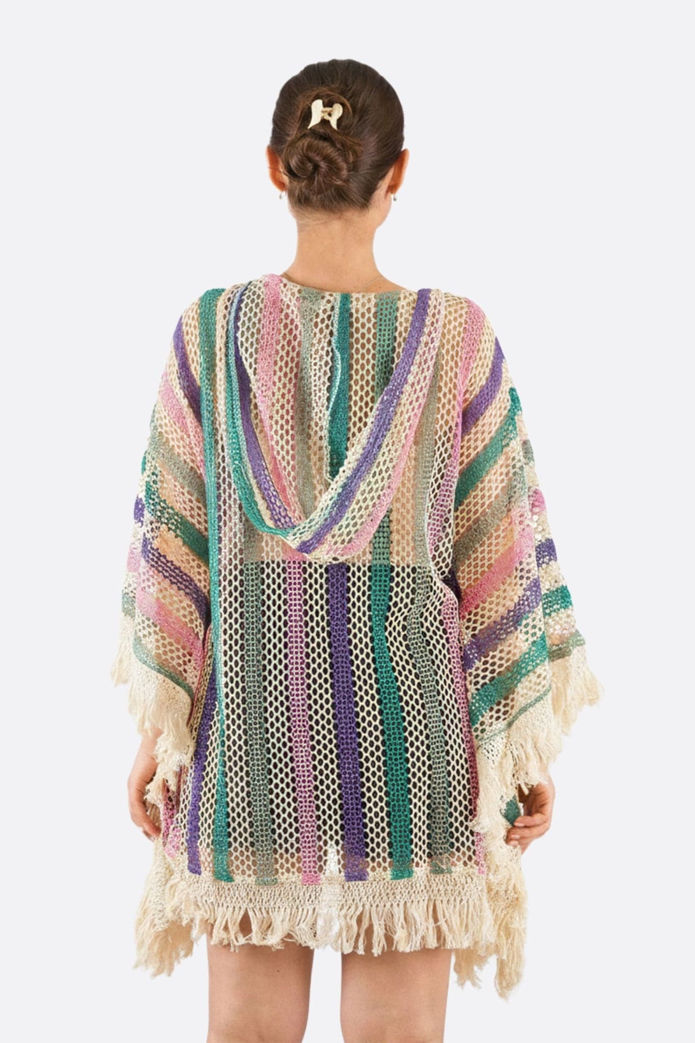 Multicolored crochet poncho with hood, alternative view highlighting vibrant stripes, ideal for getaways...