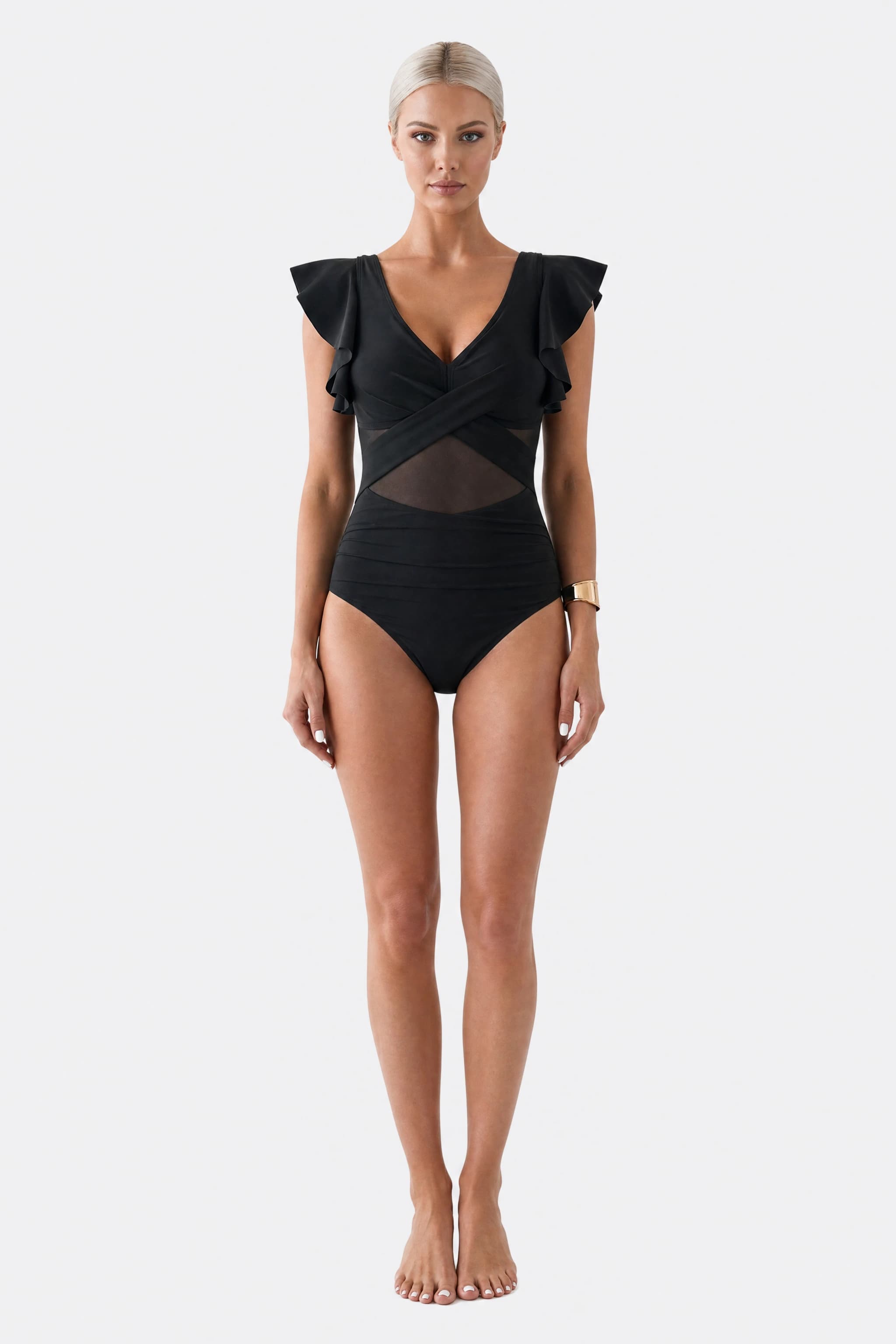 Black one-piece wrap swimsuit with ruffles, front view in the studio