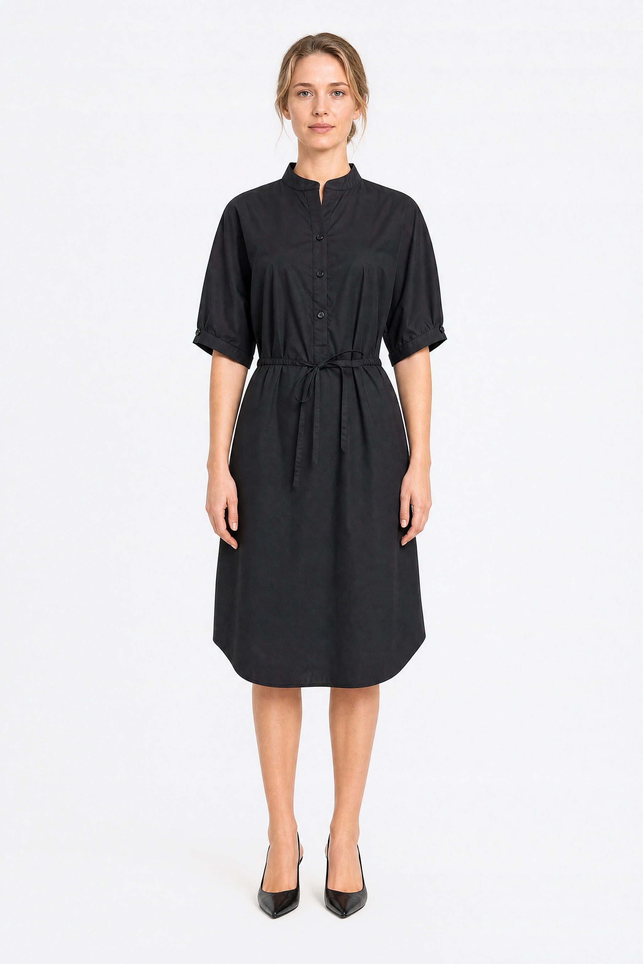 Black cotton Misciano midi shirt dress worn front-facing, officer collar, half-placket buttoned and cord tied at waist
