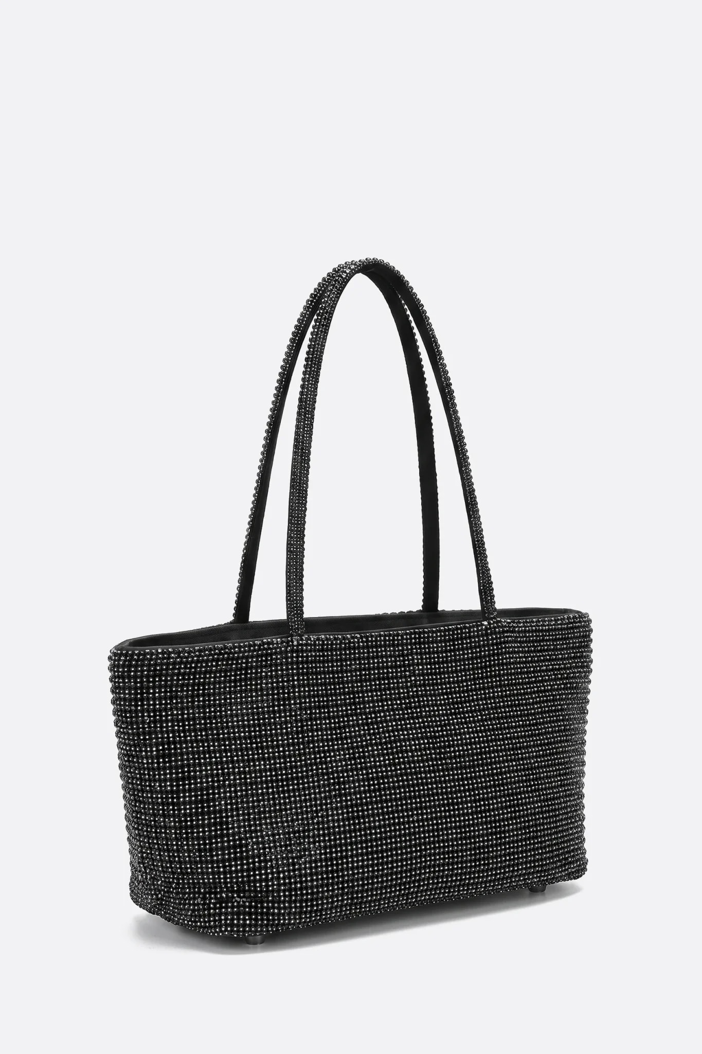 Rigid black rhinestone tote bag, profile view