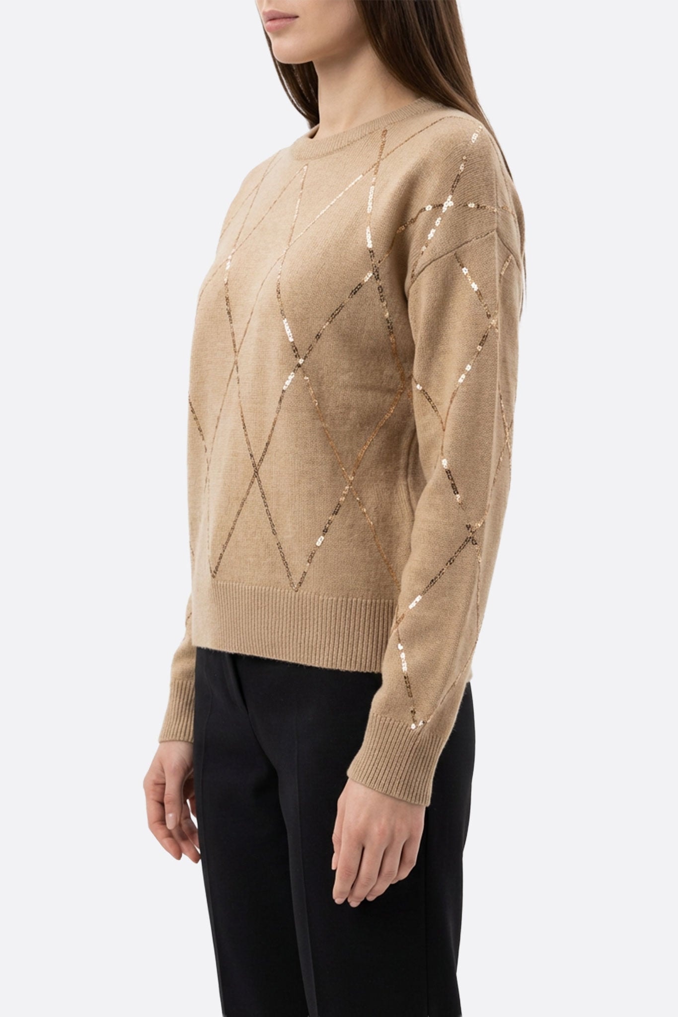 Details of the beige wool sweater, enriched with shiny sequins, perfect to enhance your elegant day or evening looks.