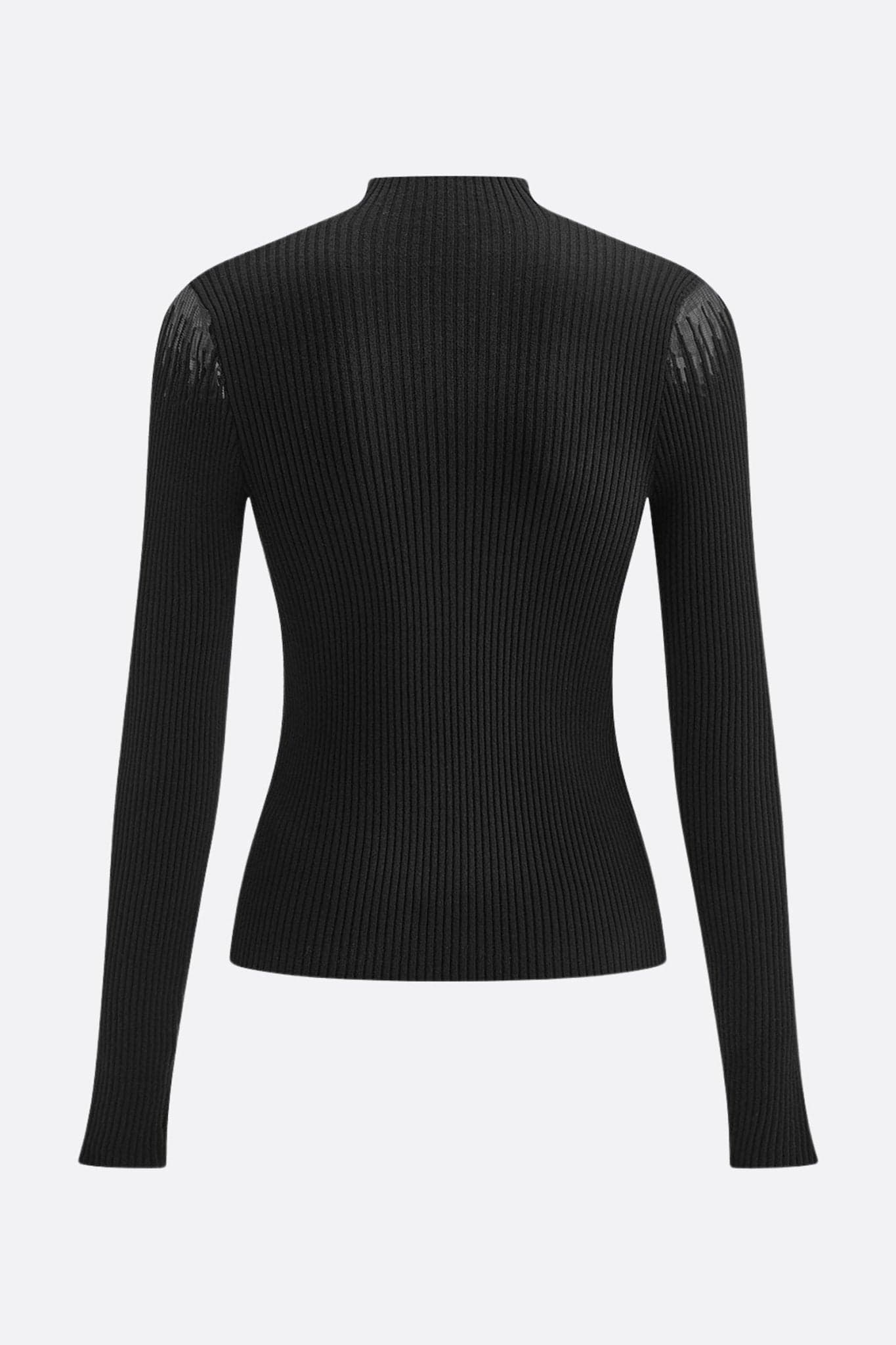 Eleganter schwarzer Pullover mit schlichtem Ausschnitt, der einen transparenten Nude-Einsatz hervorhebt, für einen anspruchsvollen Look.