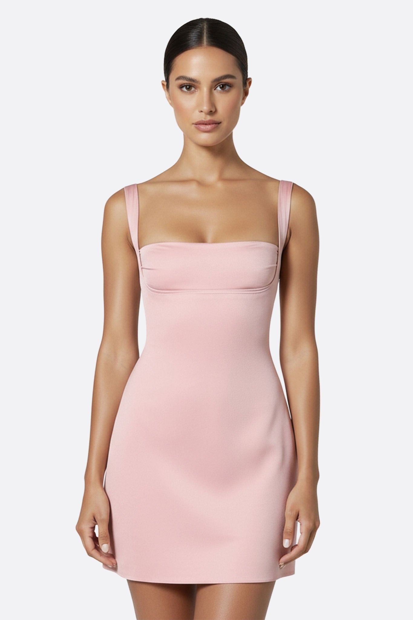 Delicate details of this pink satin dress with thin straps, ideal for a special occasion or an elegant event.