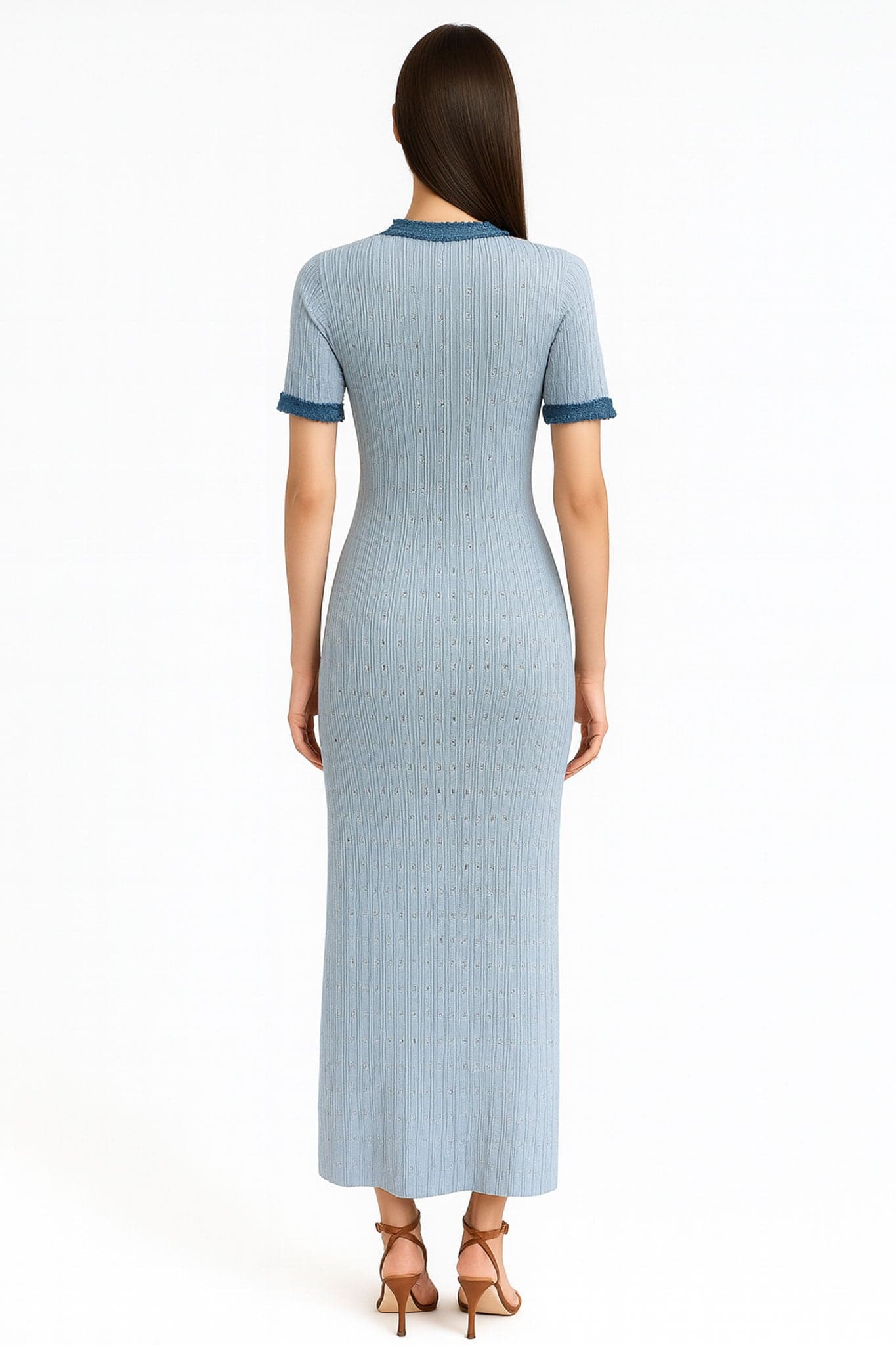 Back detail of the sky blue ribbed knit dress, accentuated by denim finishes for a chic and retro style