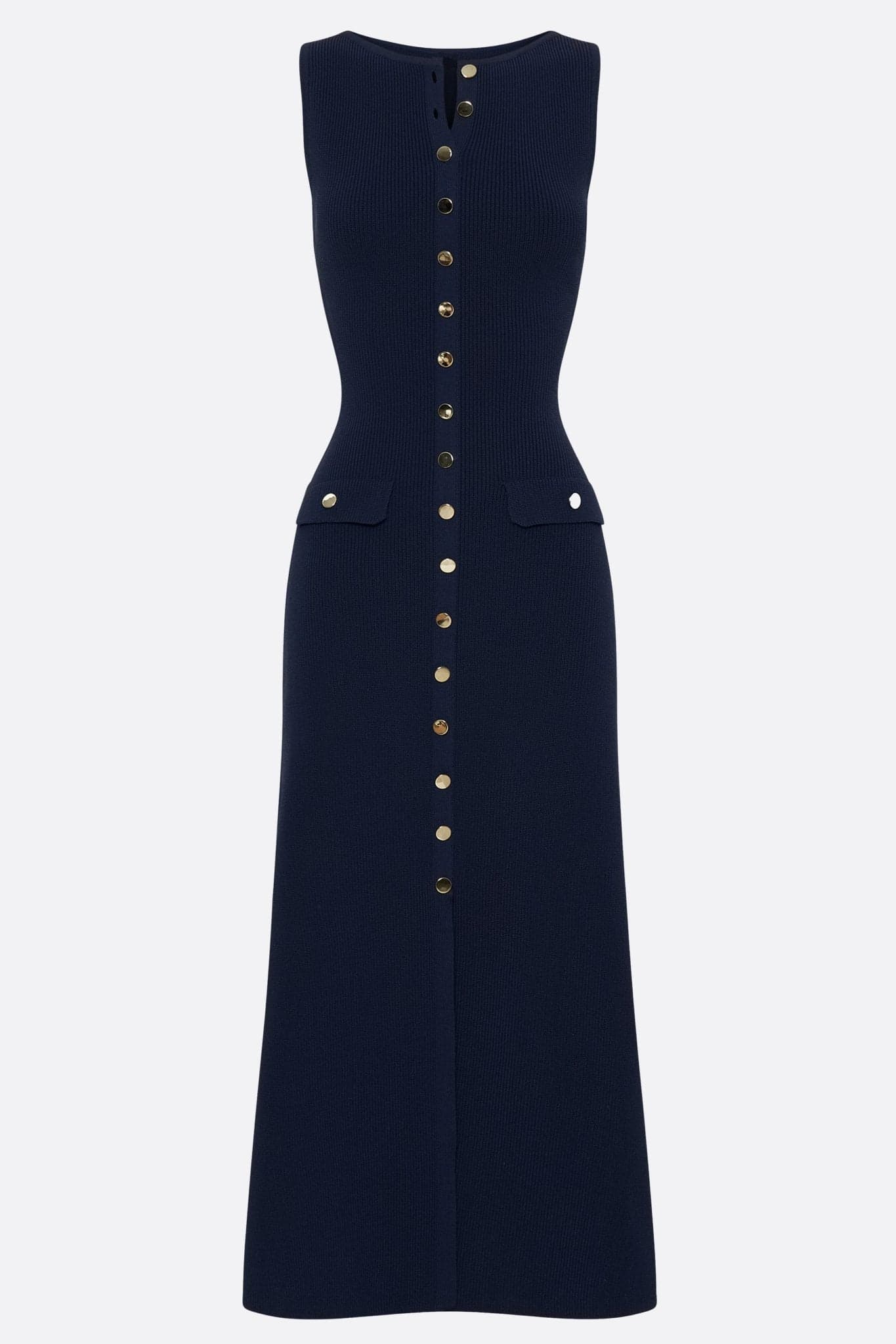 Specific detail of the long navy blue sleeveless dress, highlighting the ribbed texture and refined buttons
