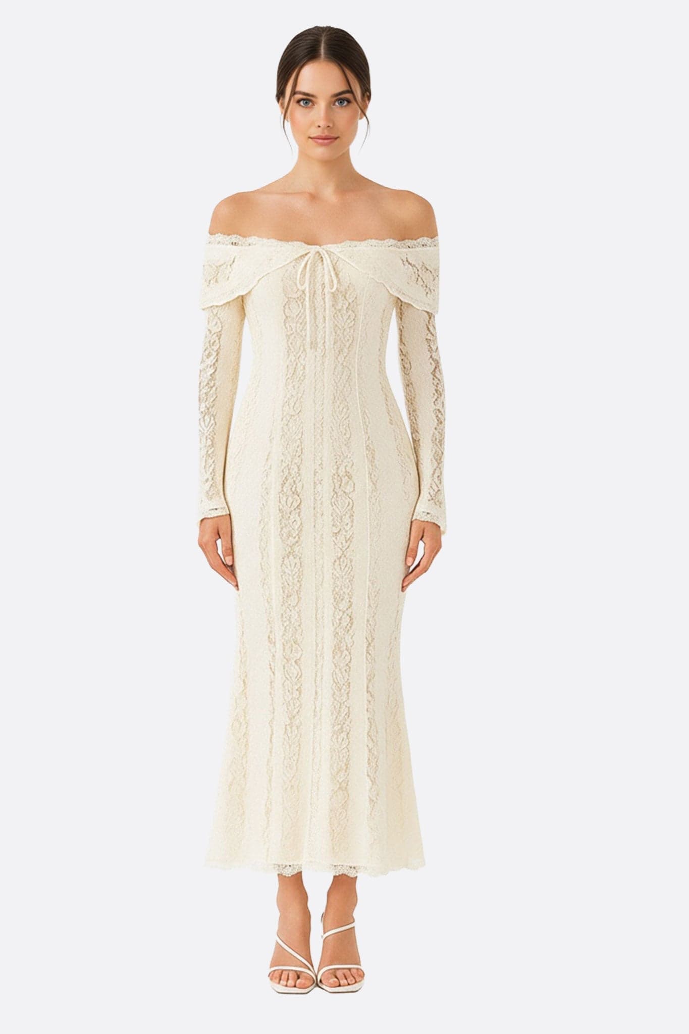 Robe longue en dentelle blanche aux épaules dénudées, parfaite pour une soirée romantique chic et raffinée.