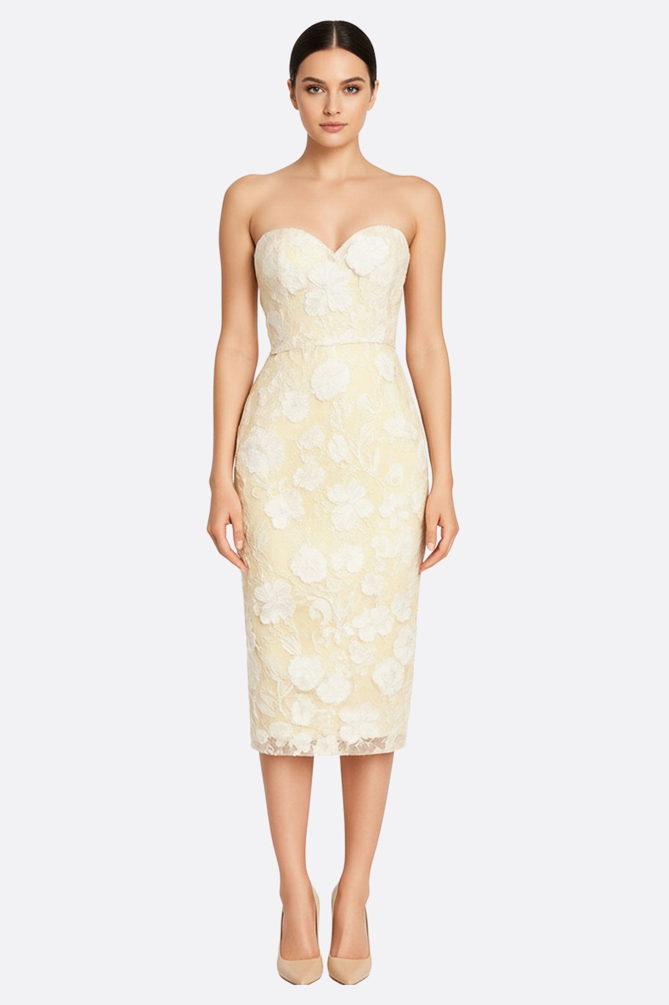 Midi bustier dress in transparent tulle with delicate floral motifs, elegant and refined for special occasions.