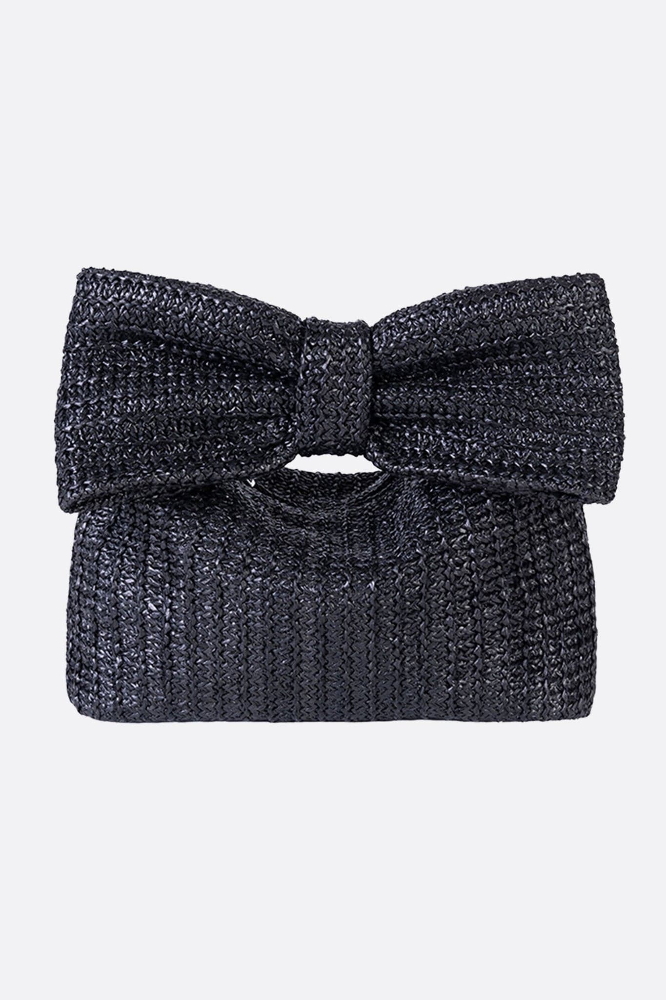 Black raffia bag with an elegant bow tie, perfect accessory to enhance a refined evening outfit.