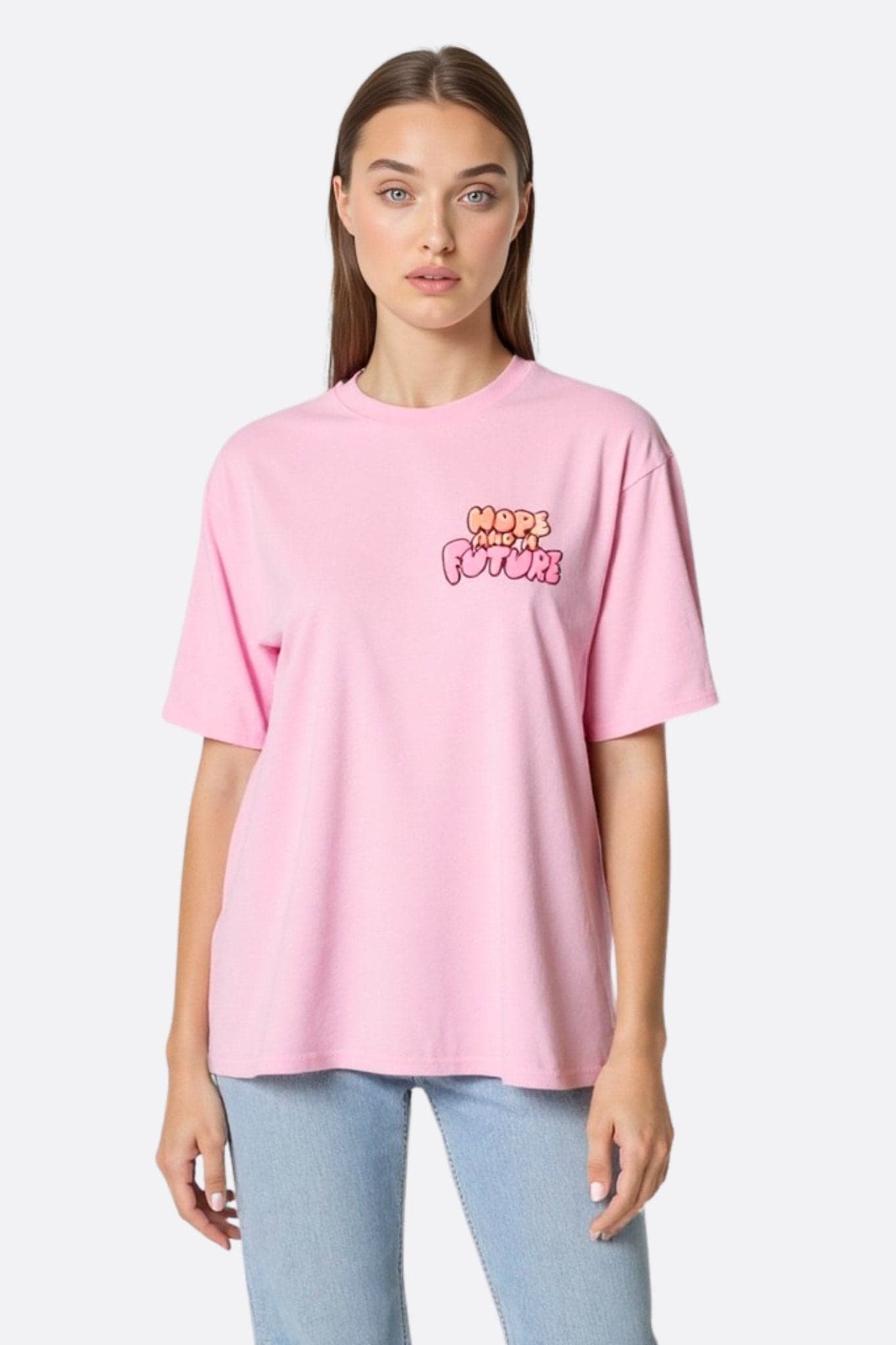 T-shirt in cotone rosa pastello dallo stile casual, con un messaggio positivo, perfetta per momenti di relax o...