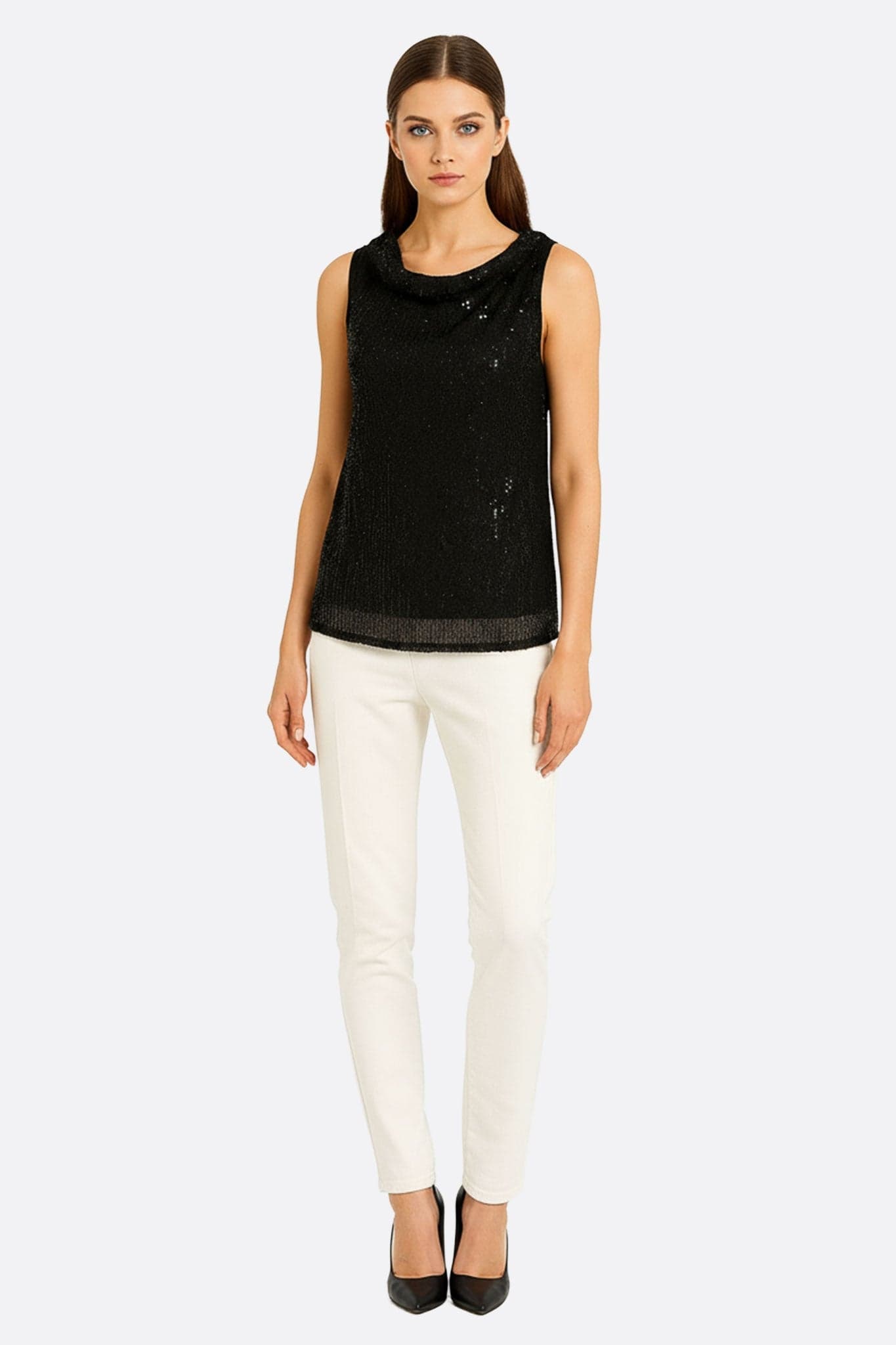 Close-up on the neckline of an elegant black top, enriched with shiny sequins, ideal for a refined evening