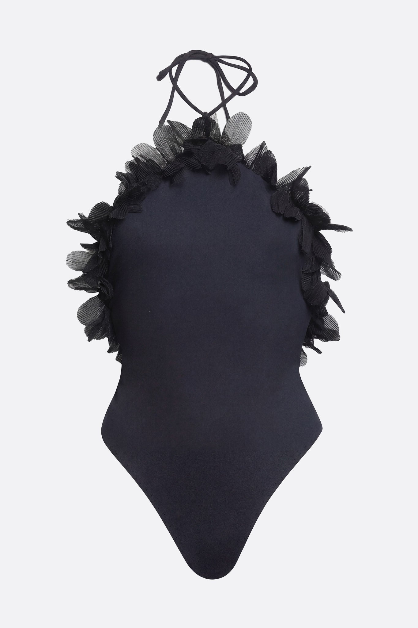 
Détails des volants d'un maillot de bain une pièce noir, parfait pour une allure chic lors des vacances à la plage.



