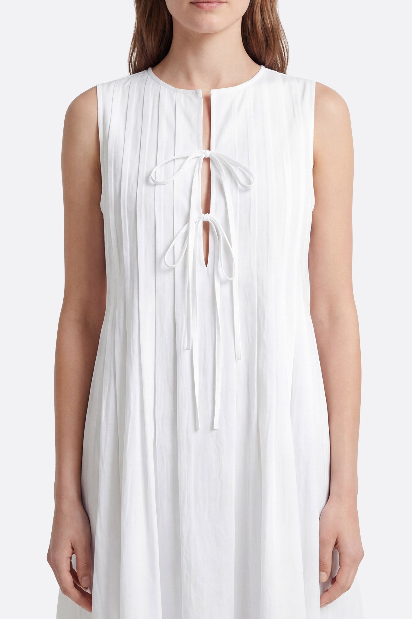 
Robe courte blanche en chanvre et coton à liens noués



