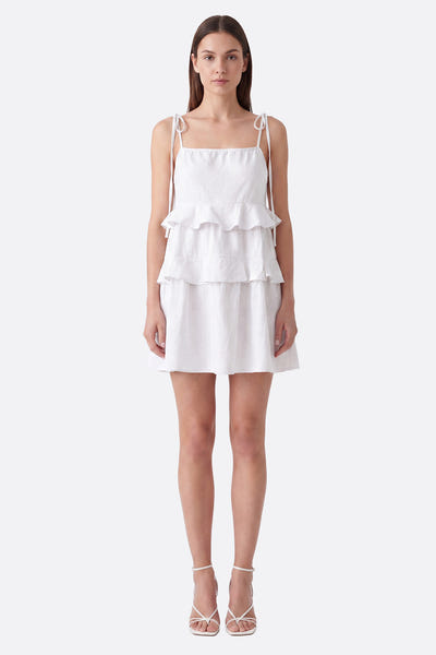 
Kurzes weißes Kleid mit Rüschen und gebundenen Trägern



