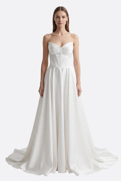 
Long white strapless wedding dress with corset and laced back



