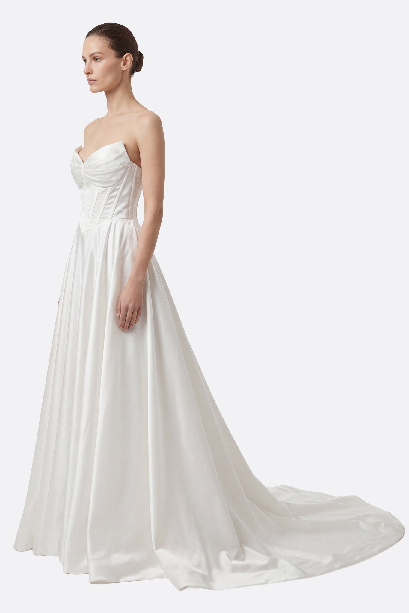 
Long white strapless wedding dress with corset and laced back



