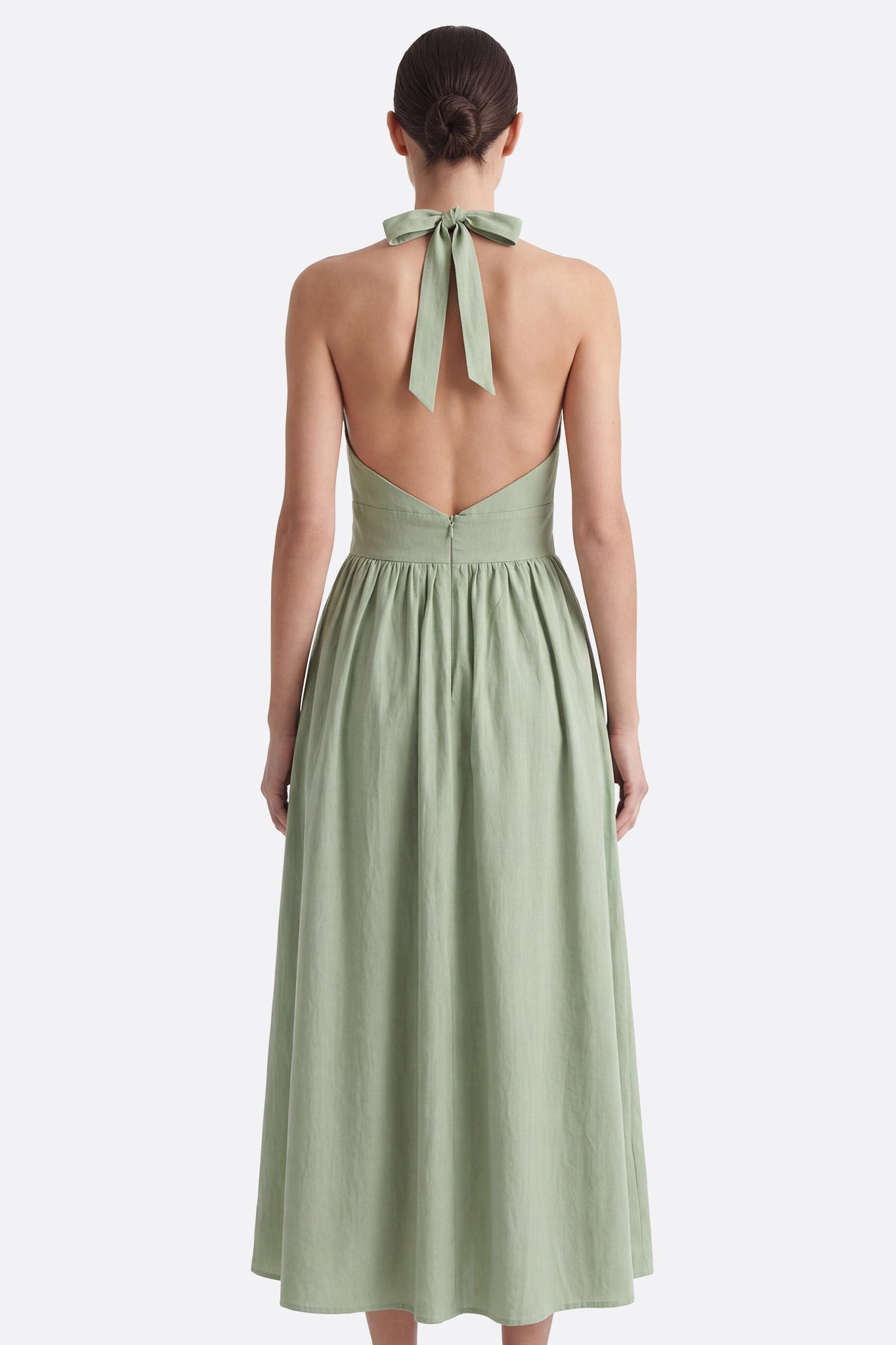Robe midi dos nu en coton vert à taille structurée
