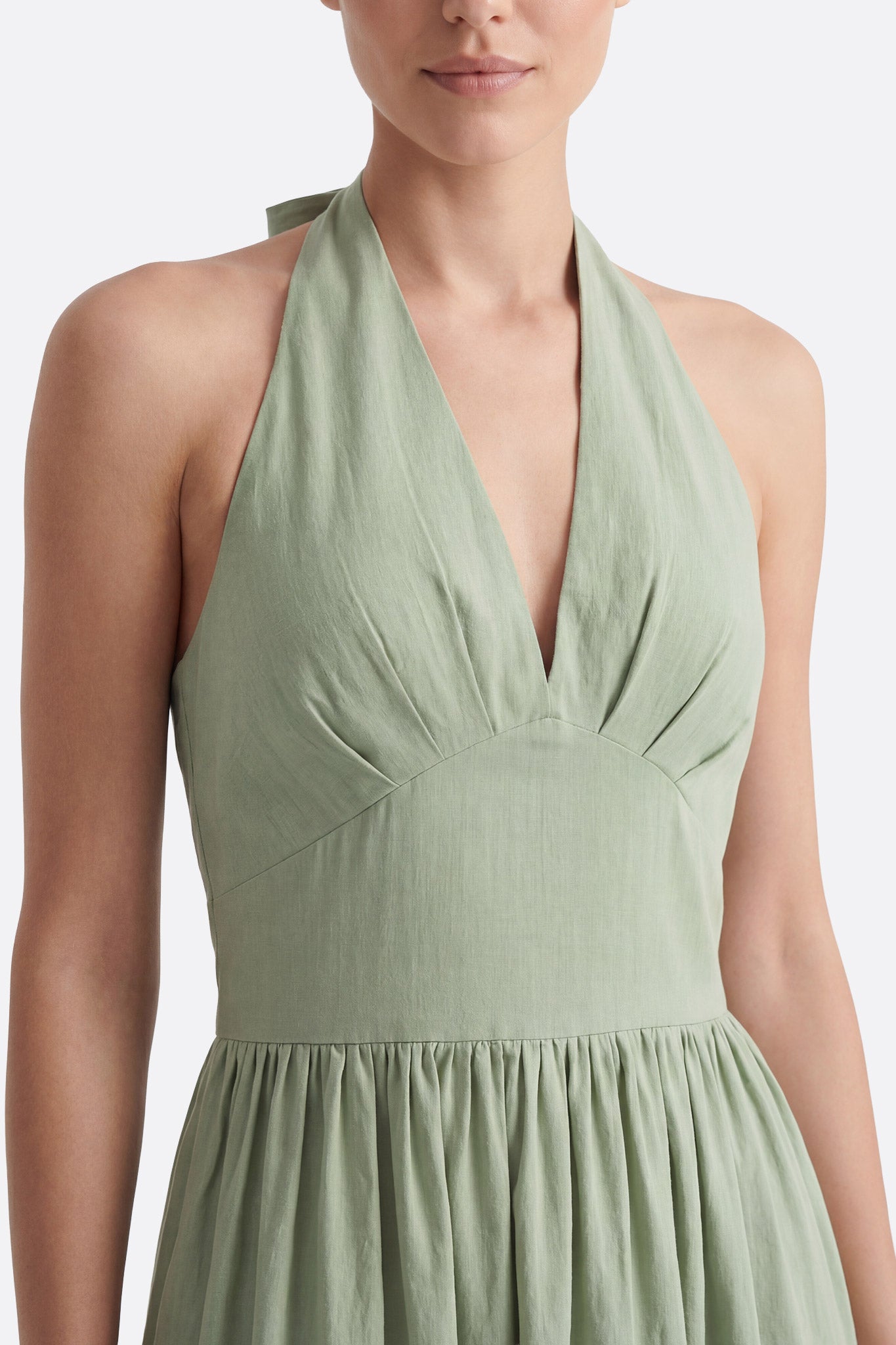 
Robe midi dos nu en coton vert à taille structurée




