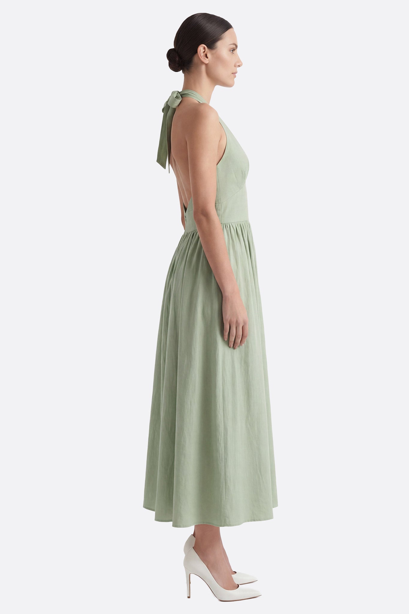 Robe midi dos nu en coton vert à taille structurée